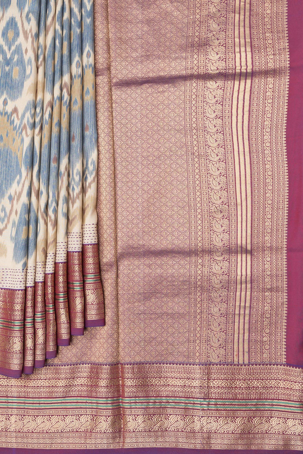 Pleats and pallu of Dark Beige Dual Tone Kanchipuram Silk Saree with Ikat Print on the body and Zari Border. 