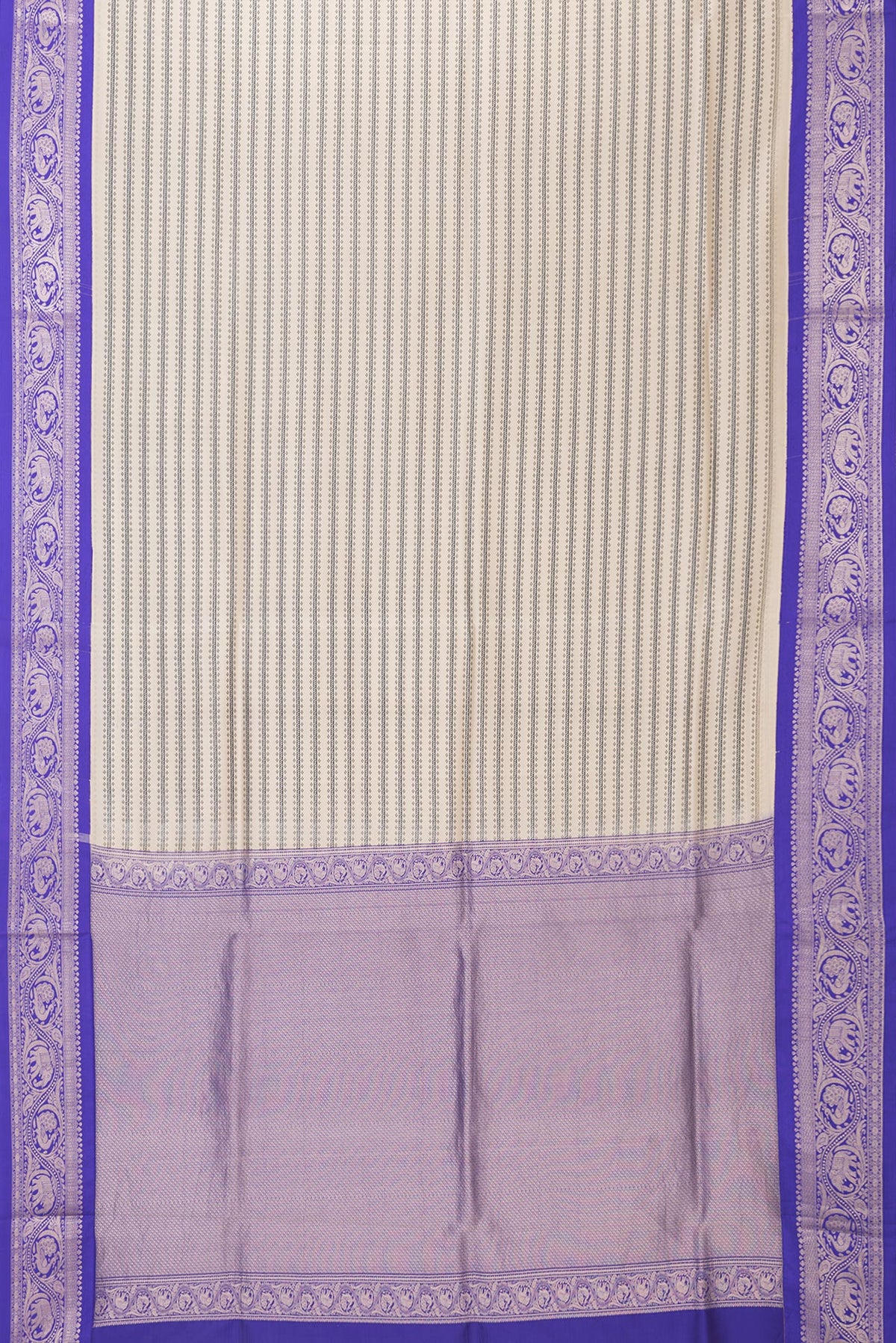 Flat view of Beige Dual Tone Kanchipuram Silk Saree with Printed design on the body and Zari Border. 