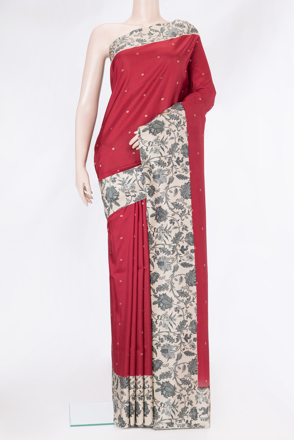 Red Dual Tone Kanchipuram Silk Saree with Zari Butta on the body and Fancy Border.  displayed on a mannequin