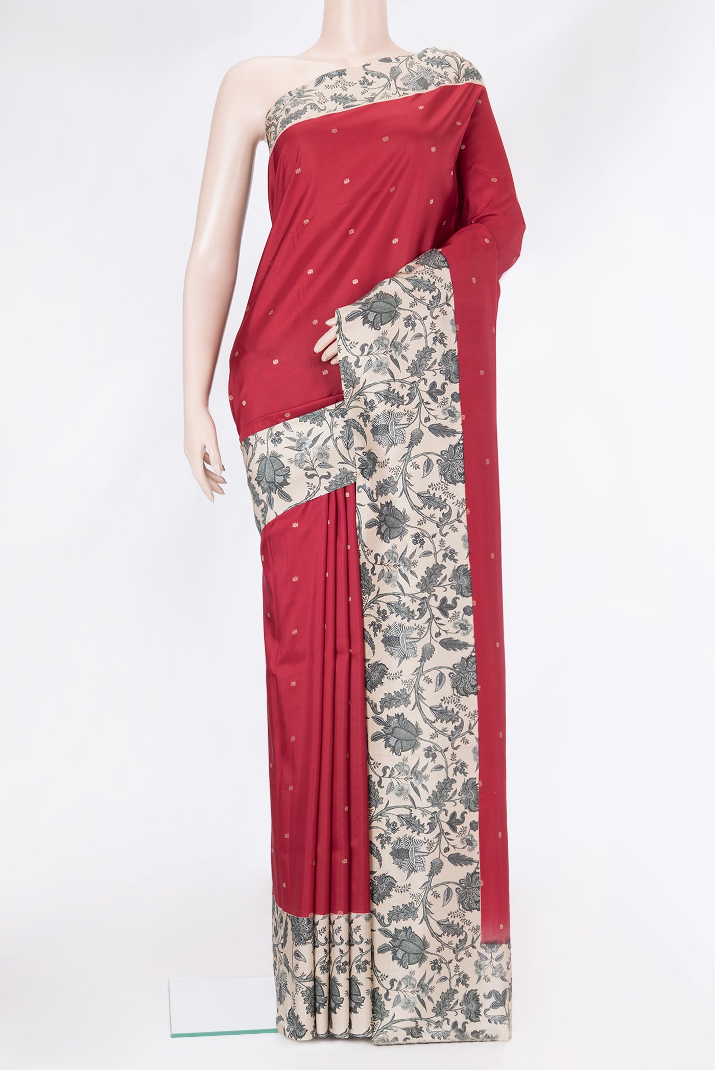 Red Dual Tone Kanchipuram Silk Saree with Zari Butta on the body and Fancy Border.  displayed on a mannequin