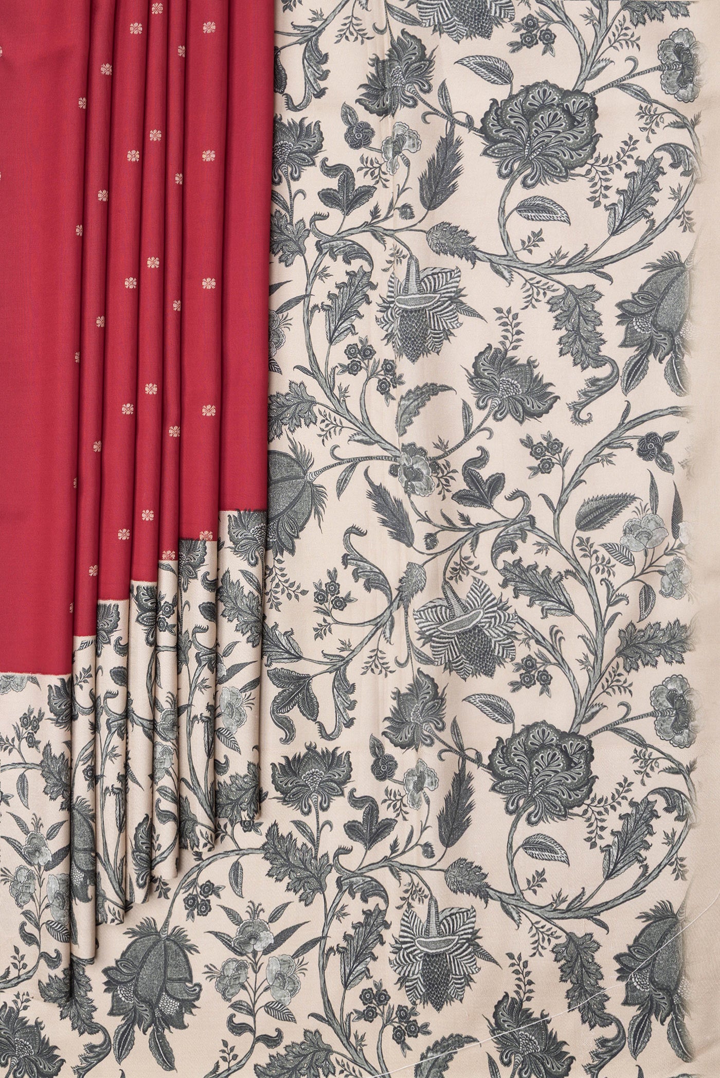 Pleats and pallu of Red Dual Tone Kanchipuram Silk Saree with Zari Butta on the body and Fancy Border. 