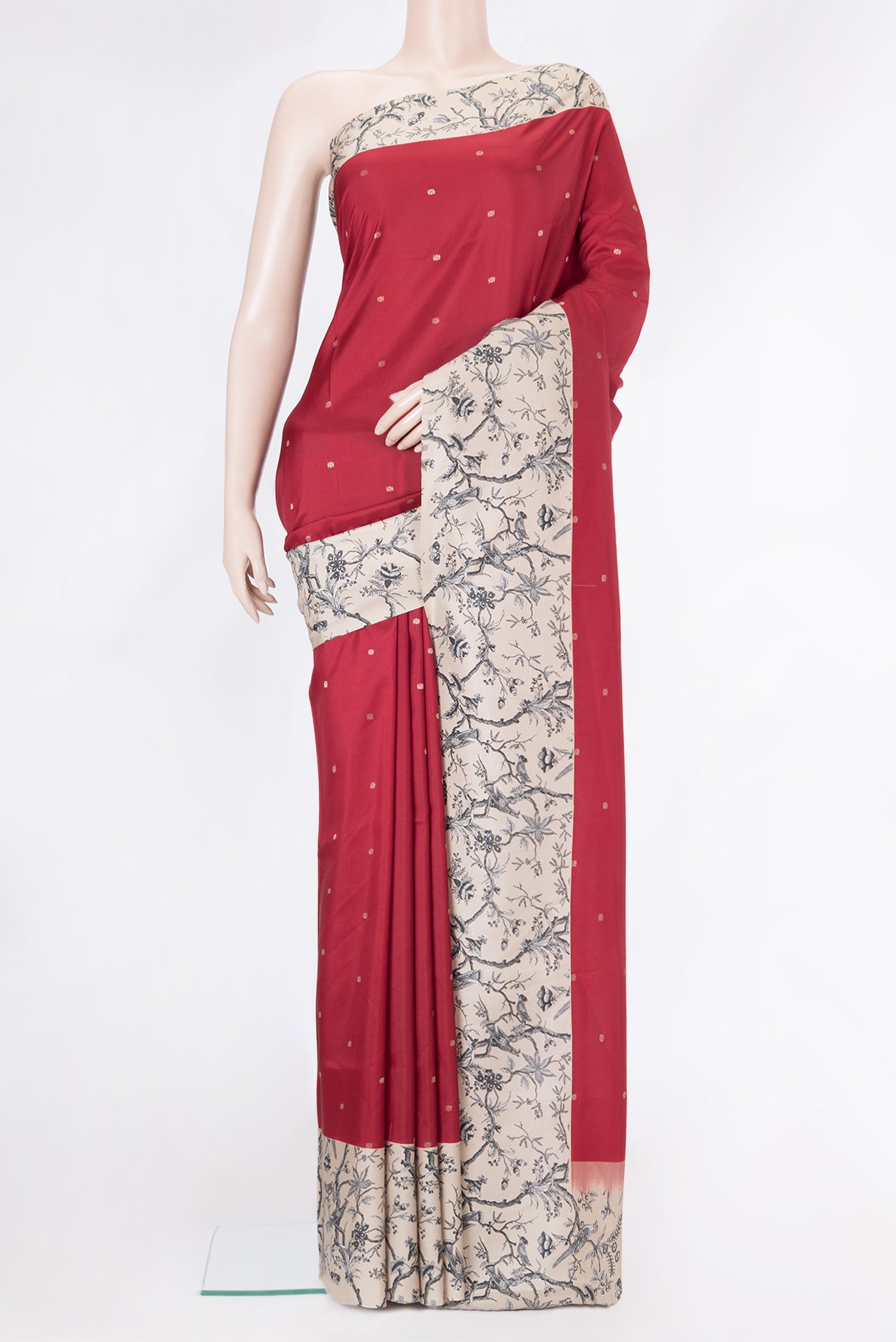 Red Dual Tone Kanchipuram Silk Saree with Zari Butta on the body and Fancy Border.  displayed on a mannequin