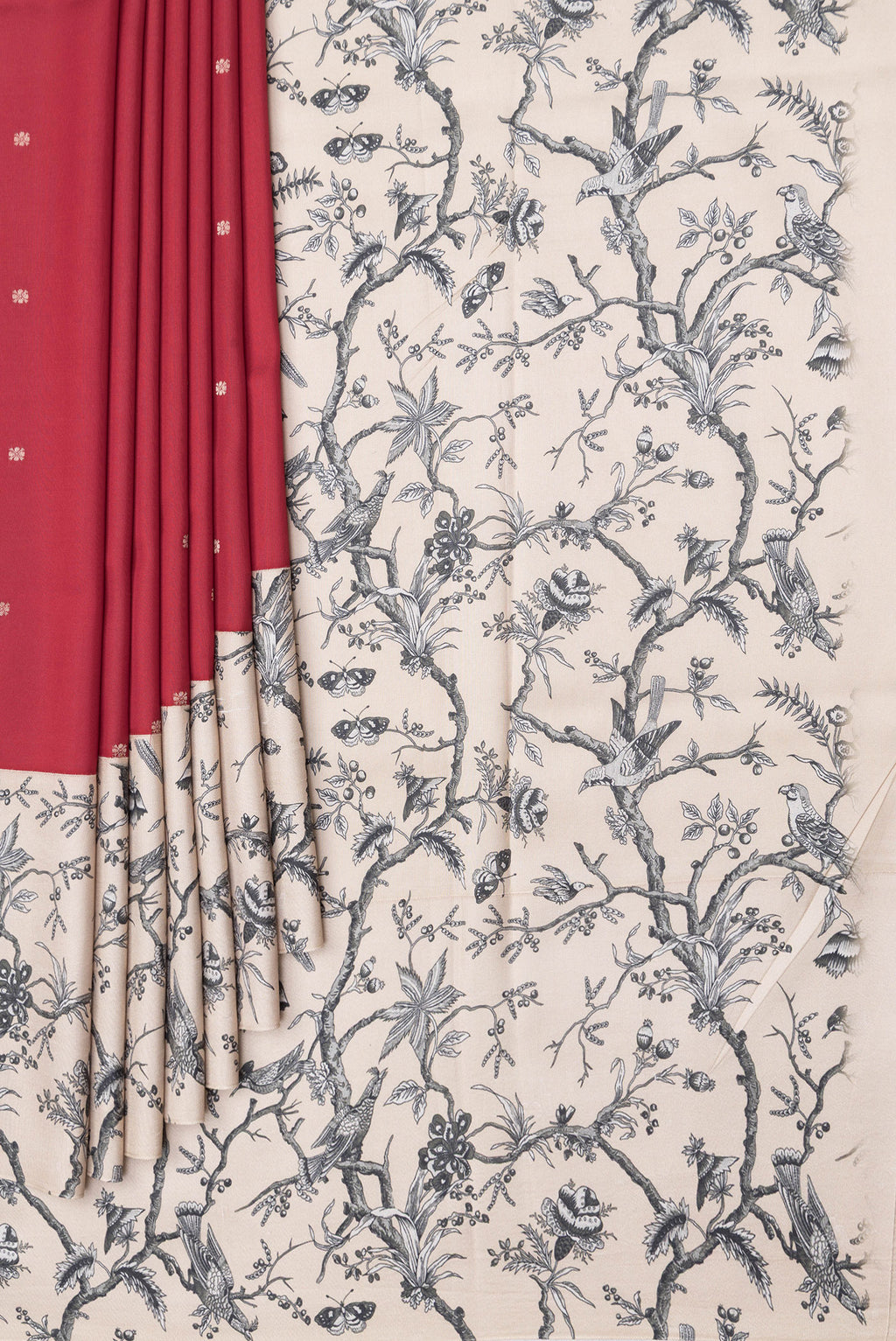 Pleats and pallu of Red Dual Tone Kanchipuram Silk Saree with Zari Butta on the body and Fancy Border. 