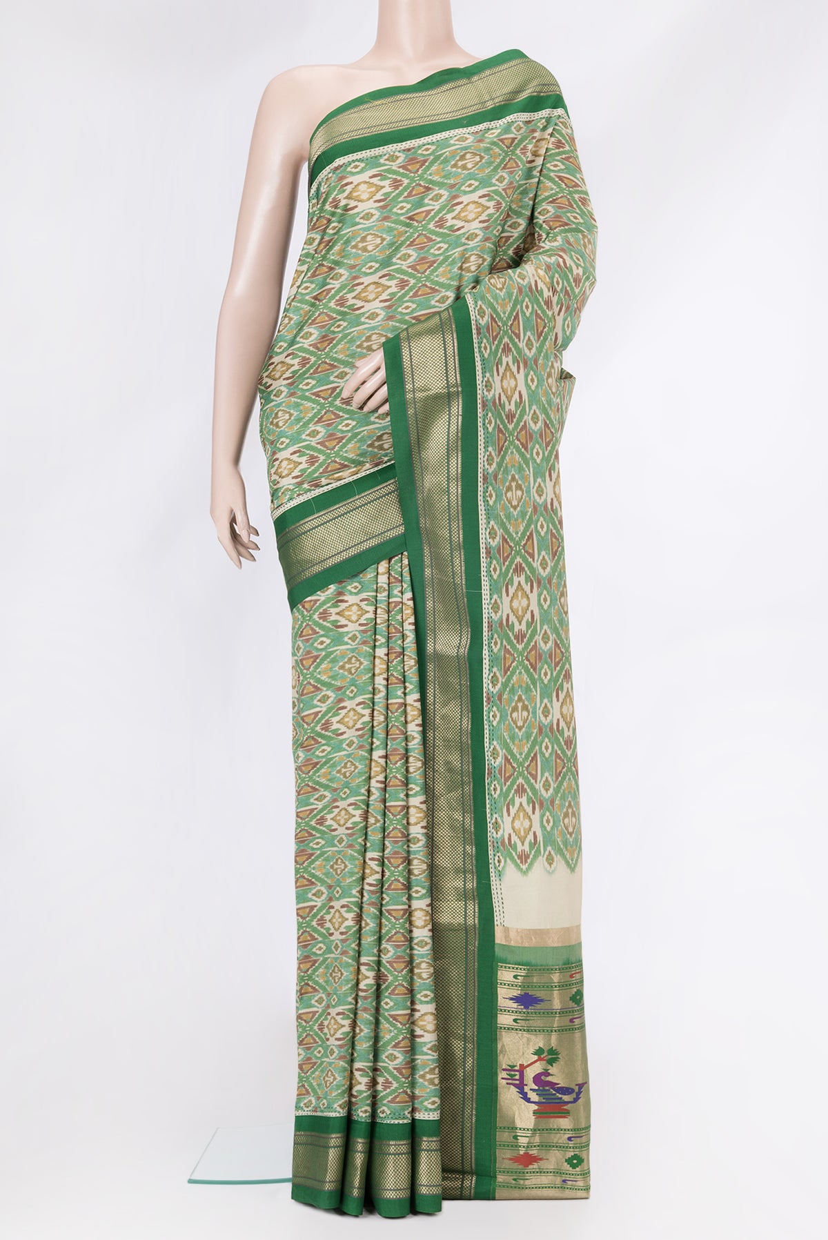 Green Dual Tone Paithani Silk Saree with Ikat Print on the body and Paithani Border.  displayed on a mannequin