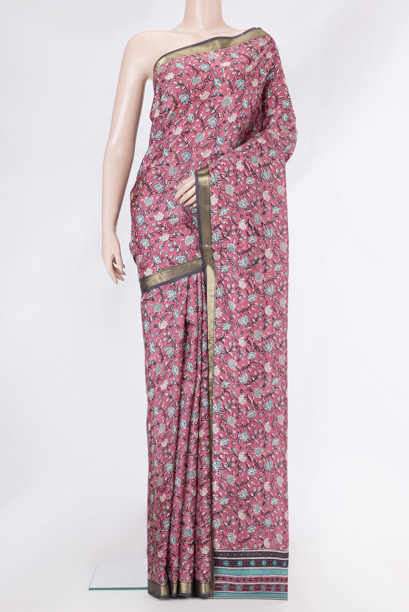 Pink Dual Tone Kanchipuram Silk Saree with Printed design on the body and Zari Border.  displayed on a mannequin