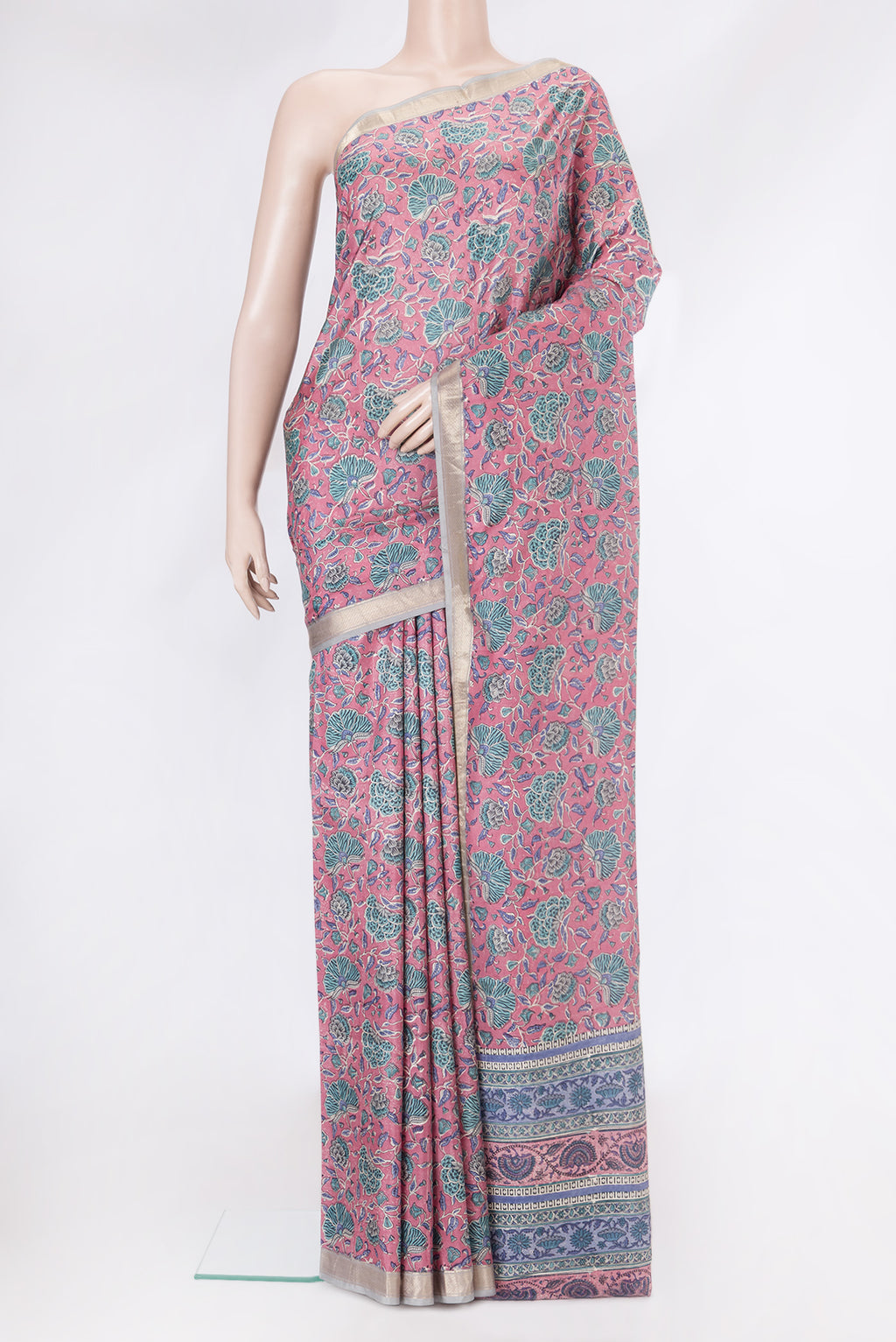 Pink Printed Silk Saree with Printed design on the body and Zari Border.  displayed on a mannequin