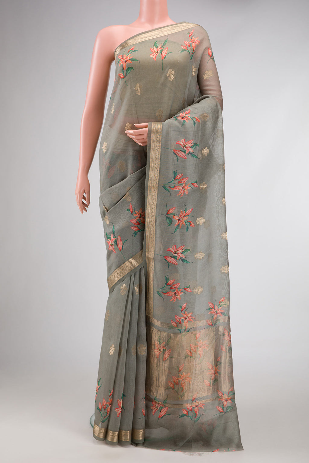 Olive Green Dual Tone Tussar Silk Saree with Zari Butta on the body and Zari Border.  displayed on a mannequin