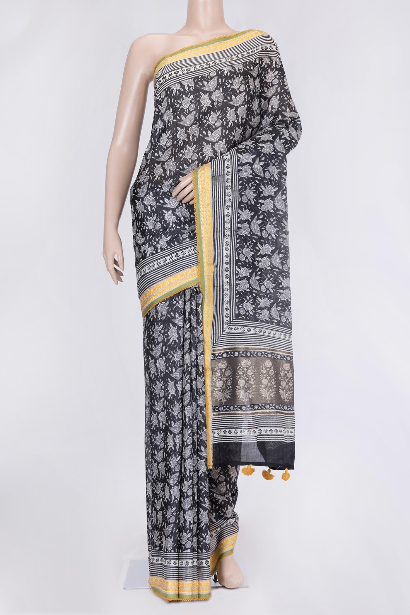 Black Dual Tone Tussar Silk Saree with Printed design on the body and Embroidery Border.  displayed on a mannequin