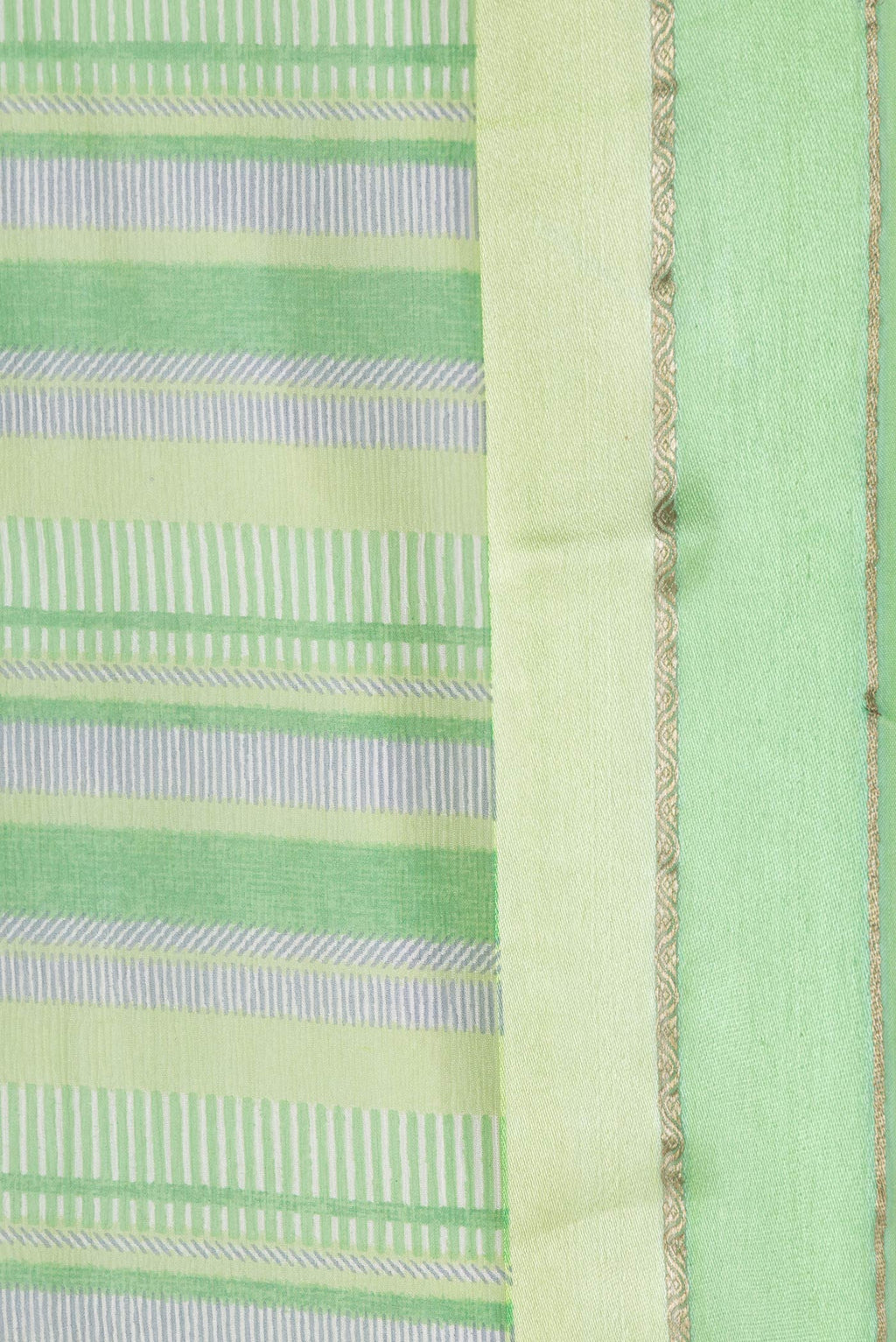 Border image of Parrot Green Dual Tone Mysore Chiffon Saree with Printed design on the body and Zari Border. 
