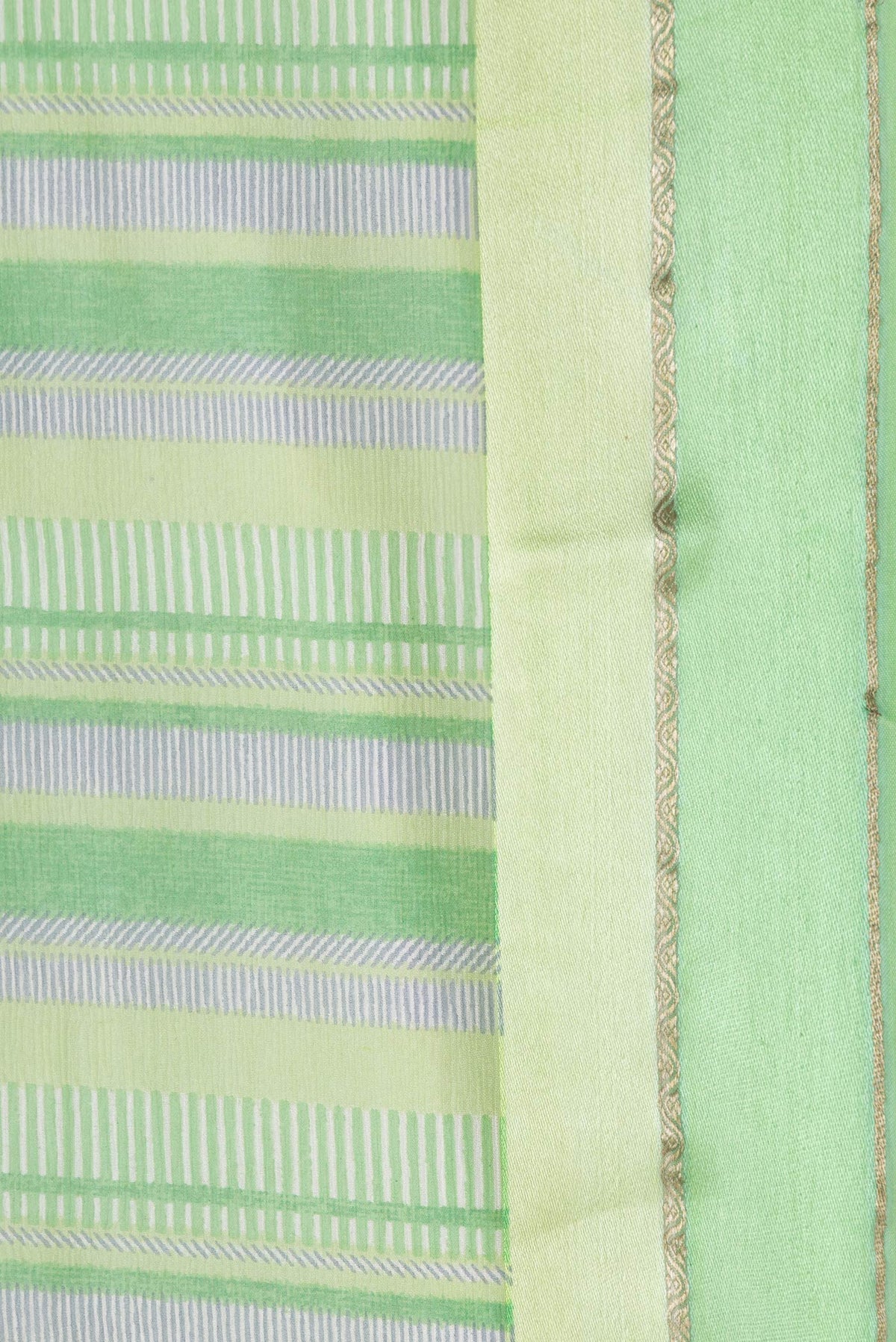 Border image of Parrot Green Dual Tone Mysore Chiffon Saree with Printed design on the body and Zari Border. 
