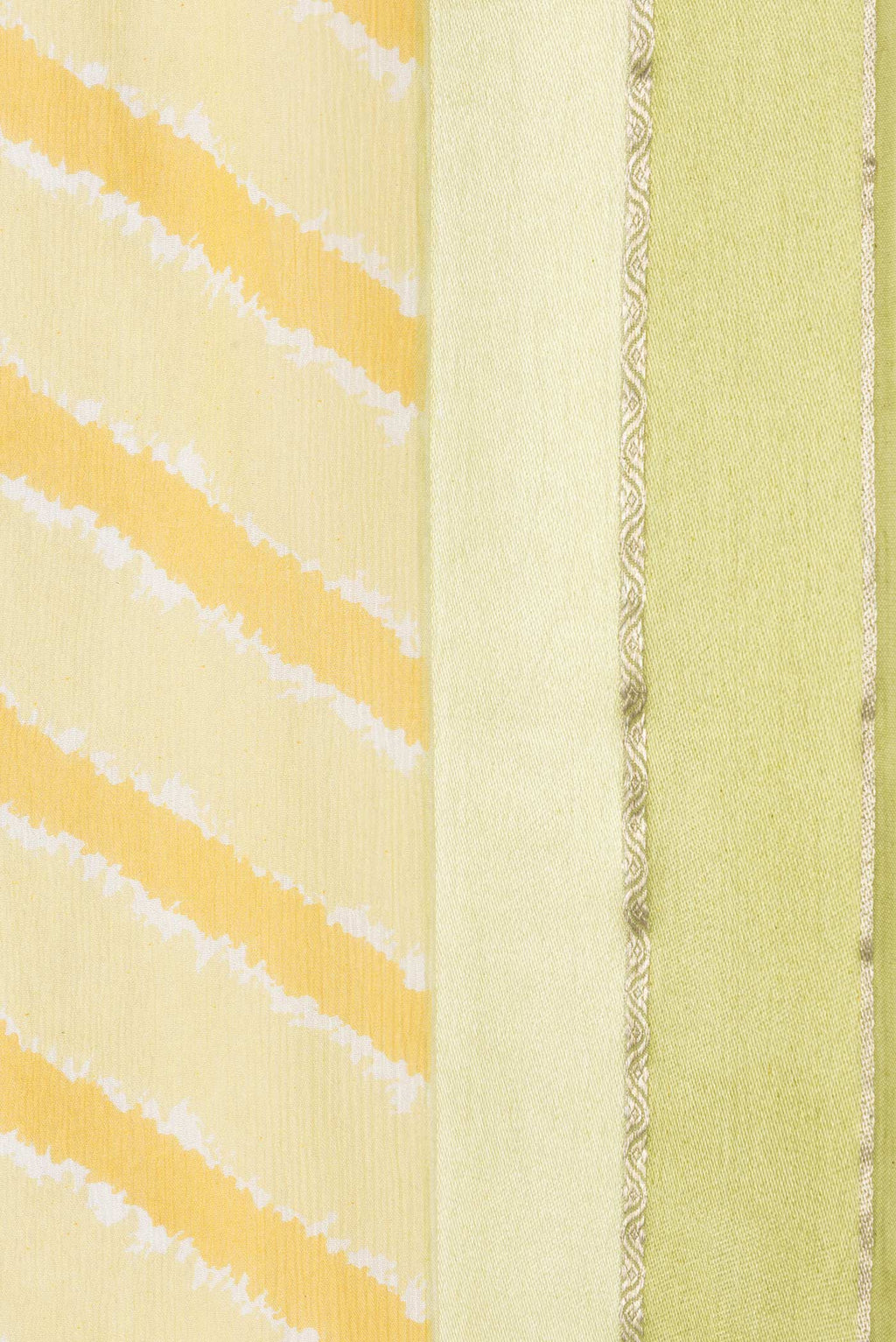 Border image of Yellow Dual Tone Chiffon Saree with Stripes on the body and Zari Border. 