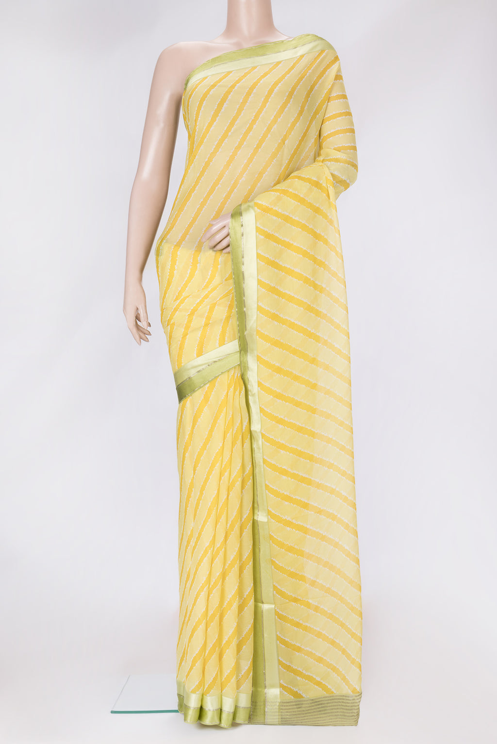 Yellow Dual Tone Chiffon Saree with Stripes on the body and Zari Border.  displayed on a mannequin