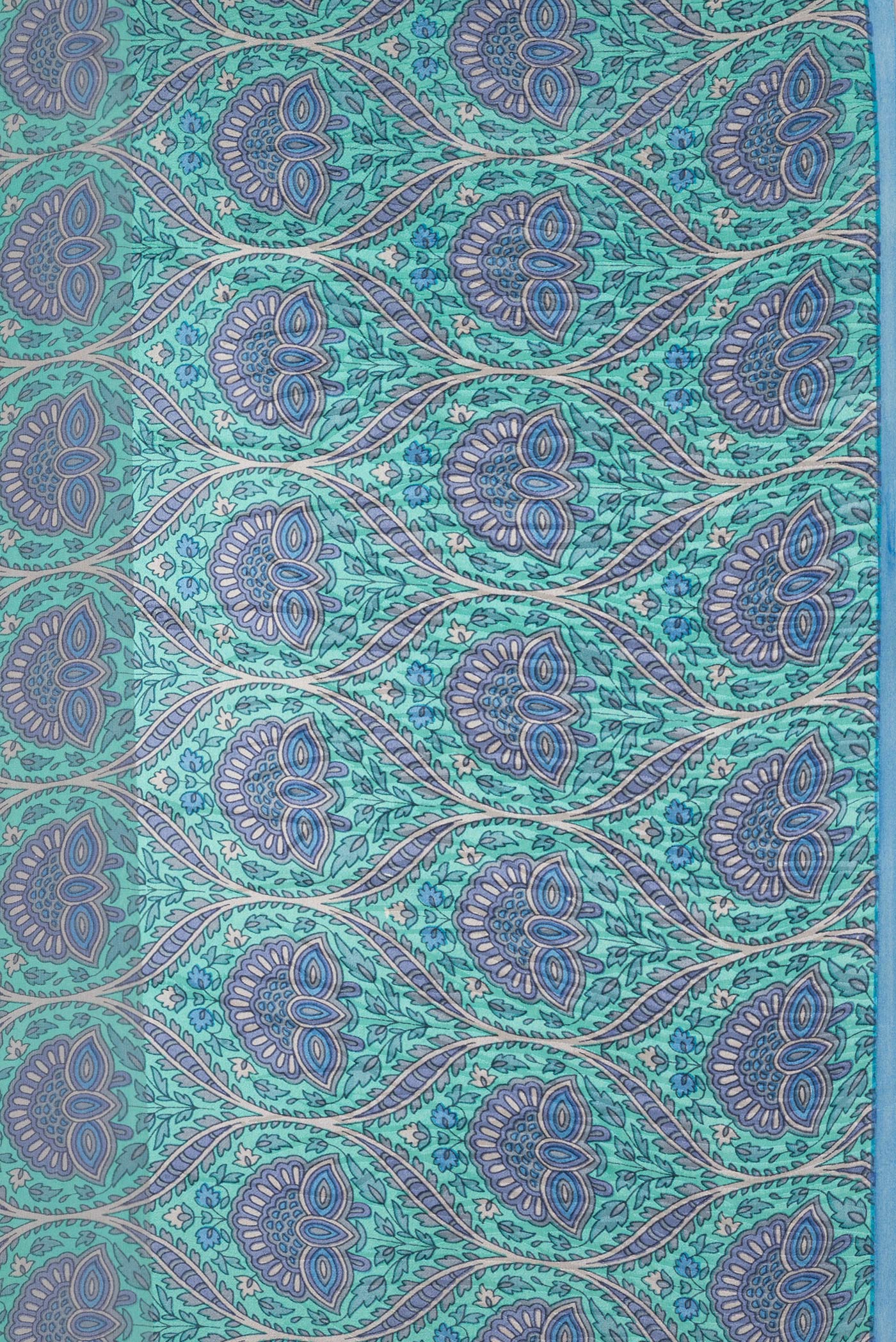 Border image of Sky Blue Dual Tone Mysore Crepe Saree with Printed design on the body and Plain Border. 