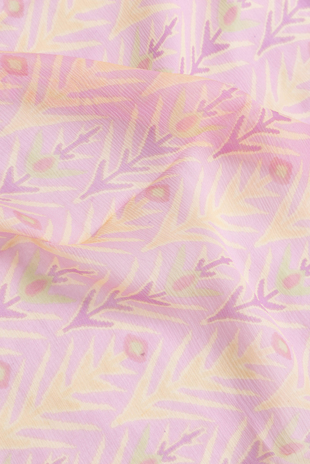 Close up of Pink Dual Tone Mysore Chiffon Saree with Printed design on the body and Zari Border.  displaying folds