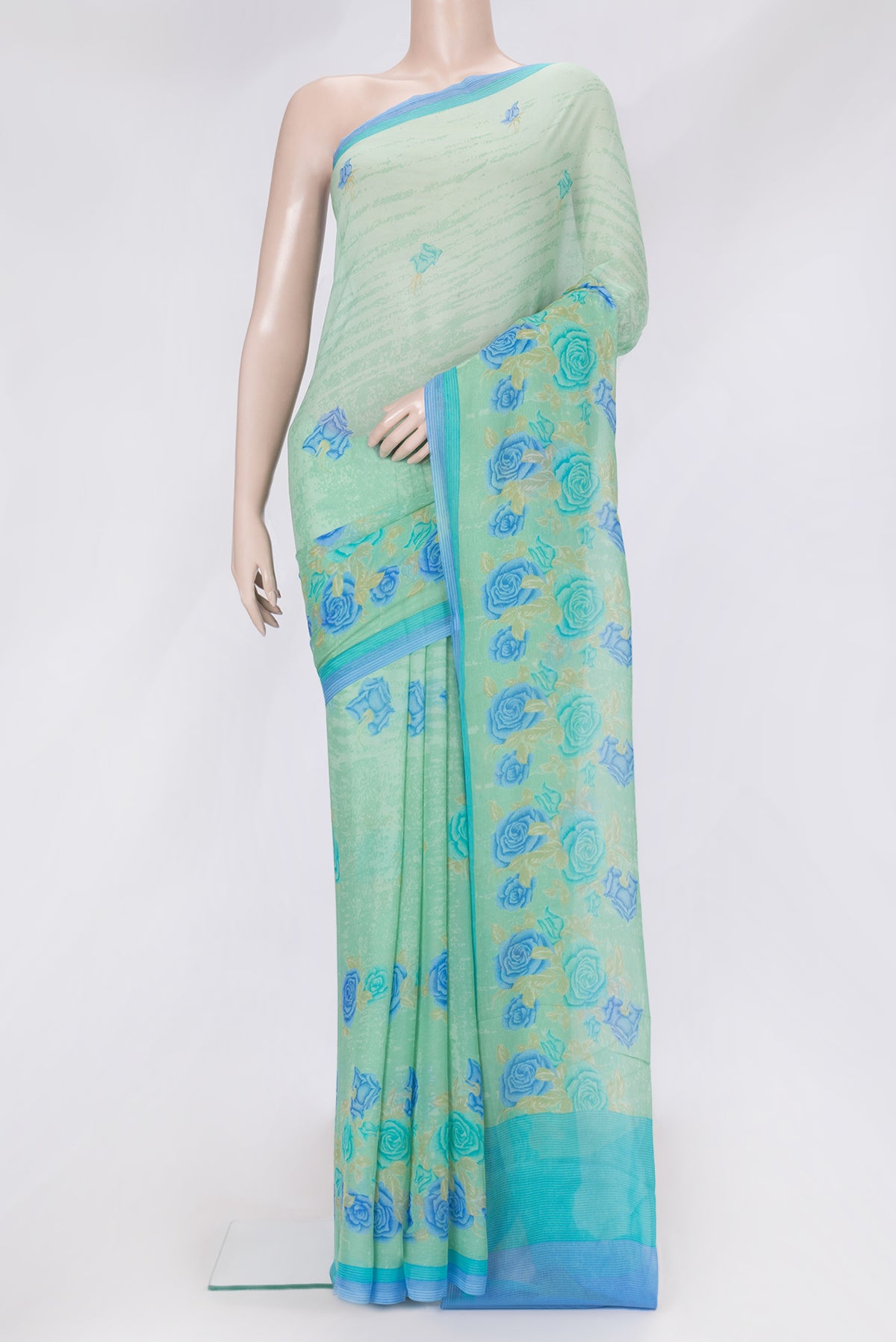 Sea Green Dual Tone Mysore Chiffon Saree with Printed design on the body and Plain Border.  displayed on a mannequin