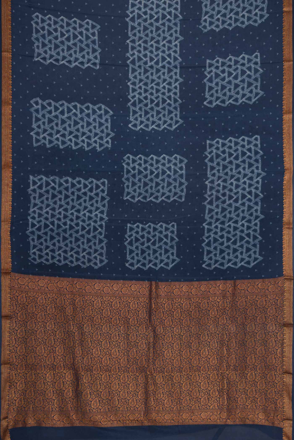 Flat view of Navy Blue Dual Tone Mysore Crepe Saree with Printed design on the body and Zari Border. 