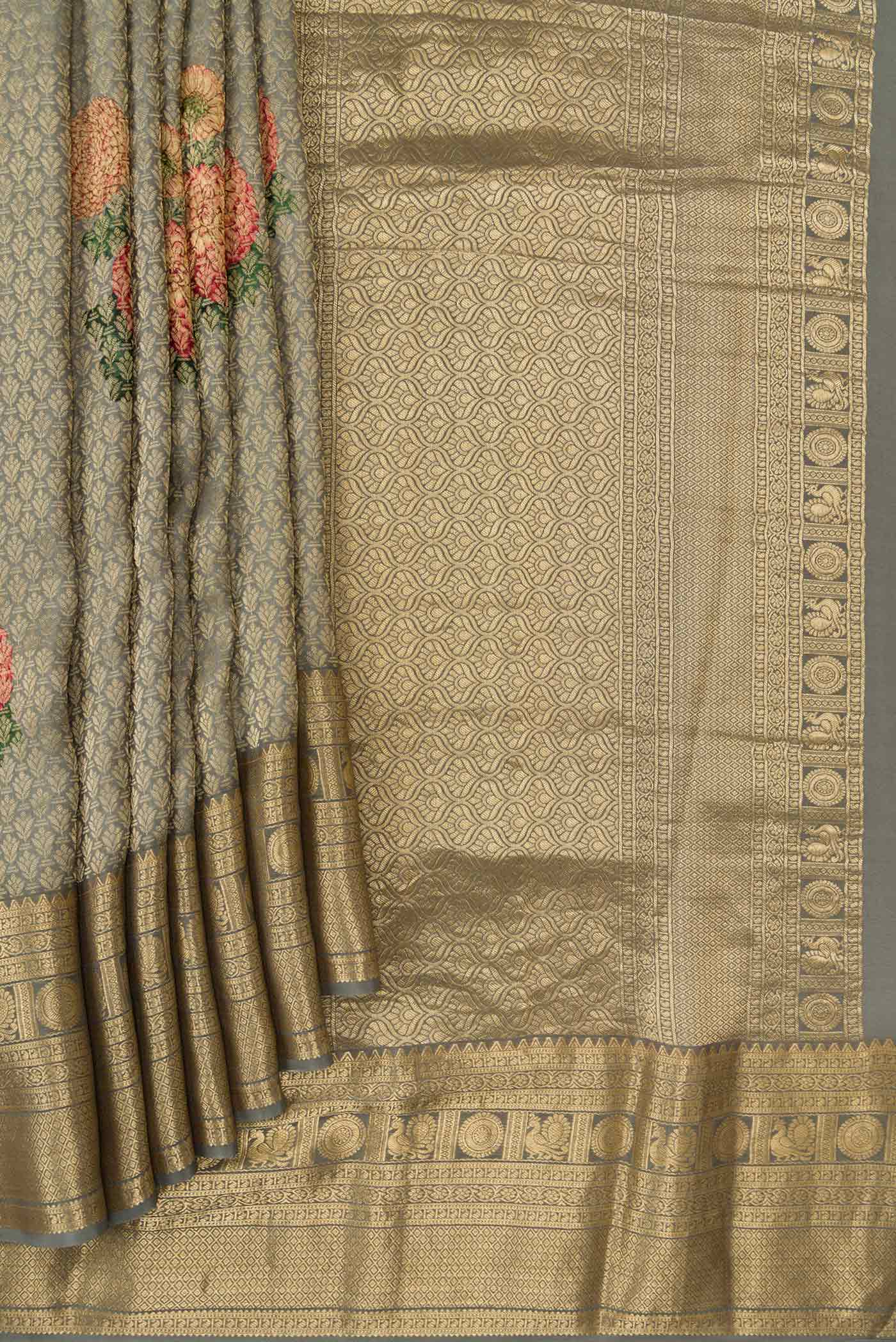 Pleats and pallu of Grey Dual Tone Mysore Georgette Saree with Zari Brocade on the body and Zari Border. 