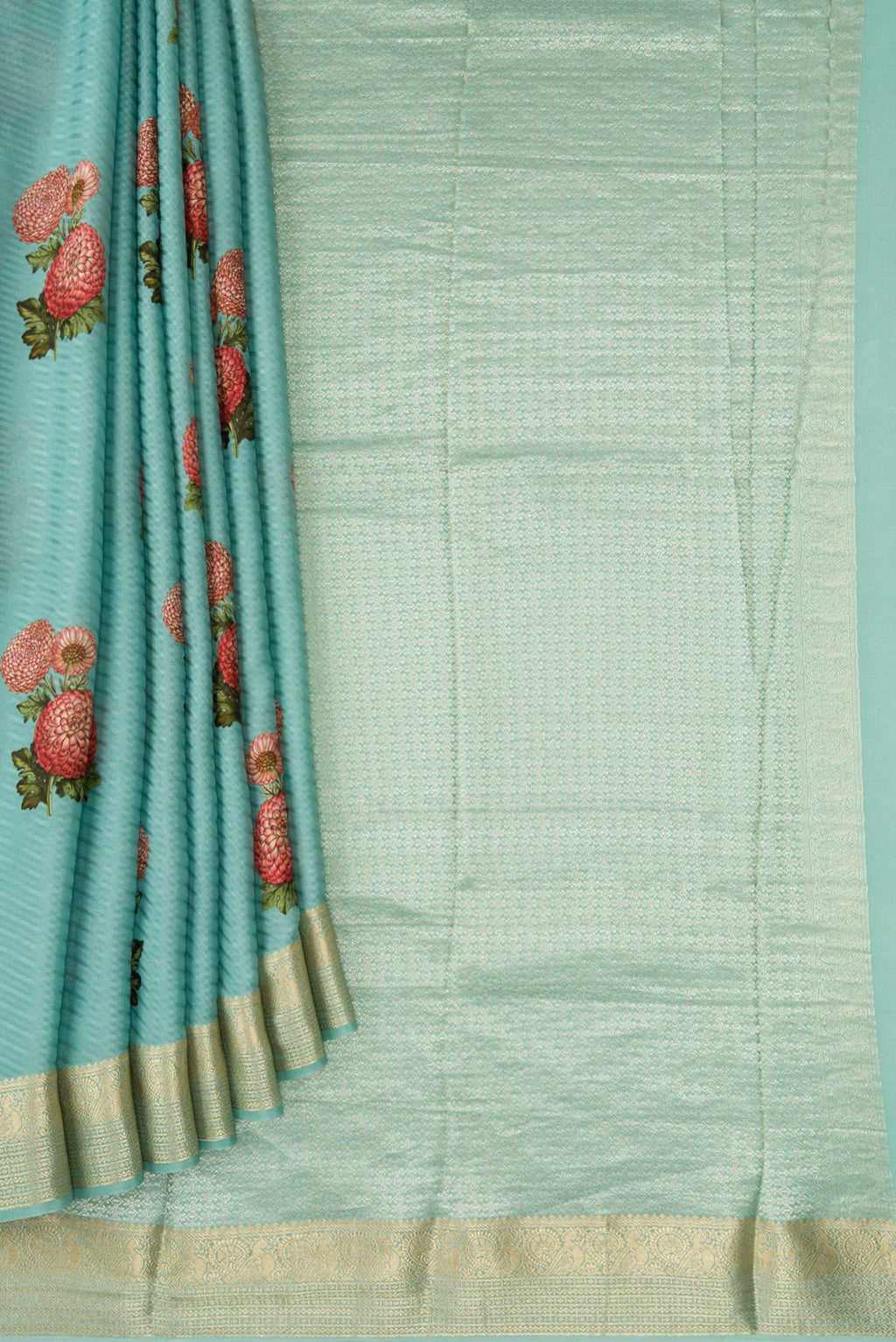 Pleats and pallu of Light Blue Dual Tone Tussar Silk Saree with Printed design on the body and Zari Border. 