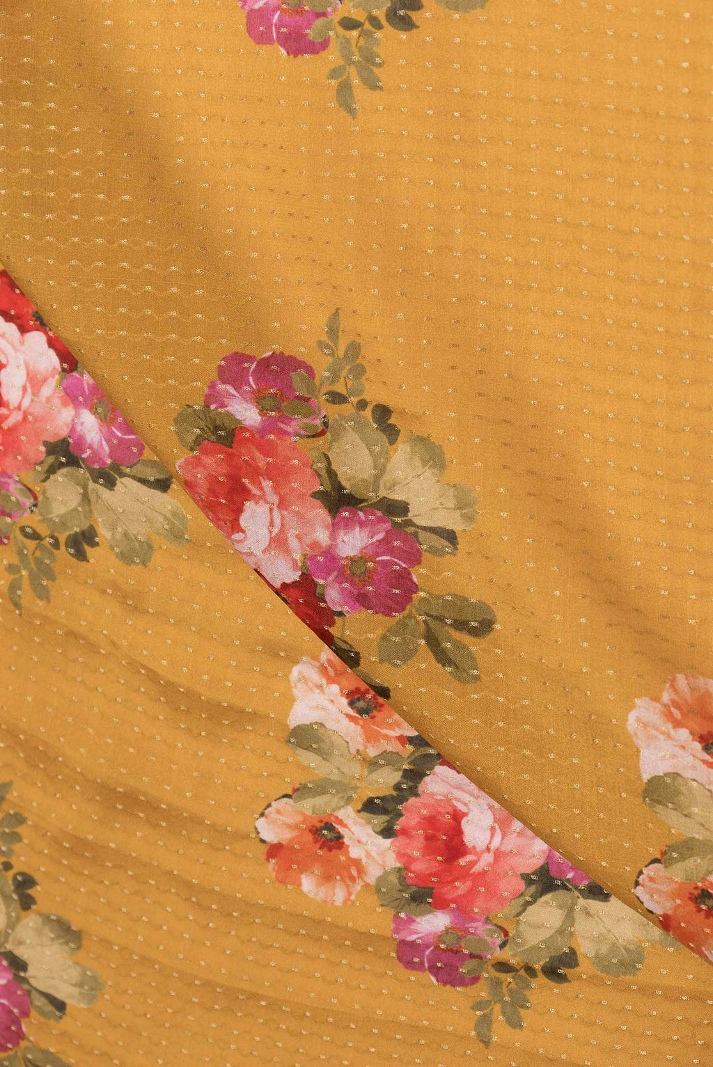 Close up of Mustard Mysore Crepe Saree with Zari Butta on the body and Zari Border displaying folds