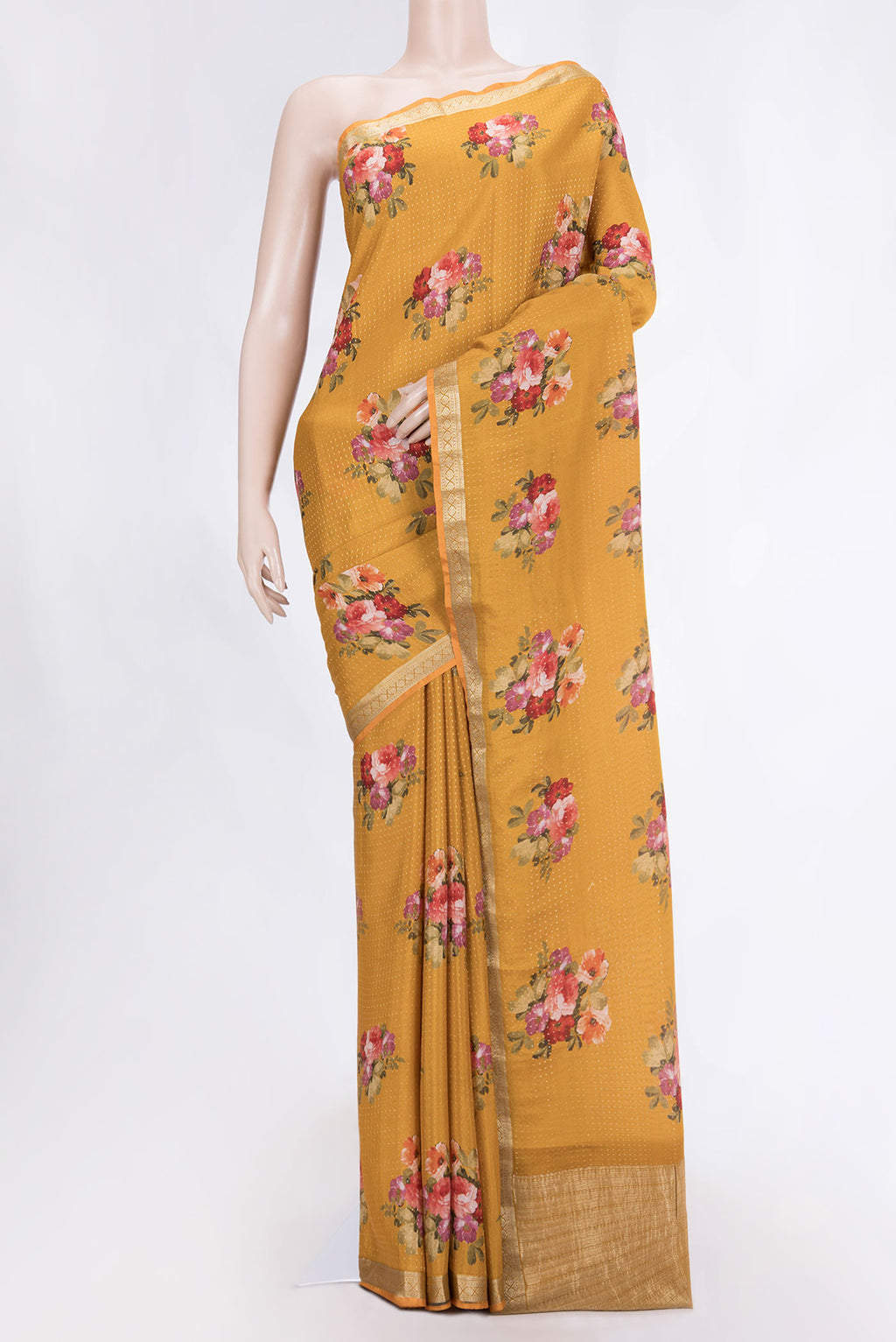 Mustard Mysore Crepe Saree with Zari Butta on the body and Zari Border displayed on a mannequin