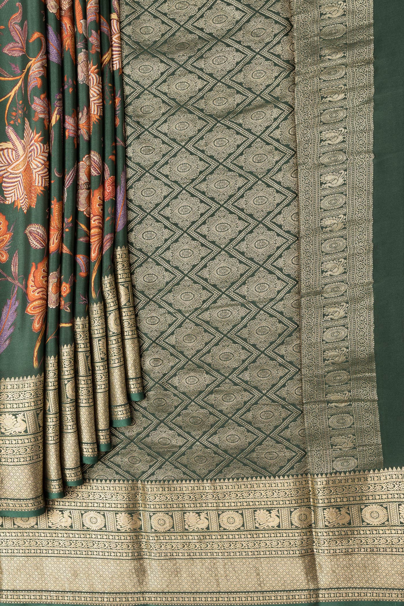 Pleats and pallu of Bottle Green Dual Tone Mysore Crepe Saree with Printed design on the body and Zari Border. 