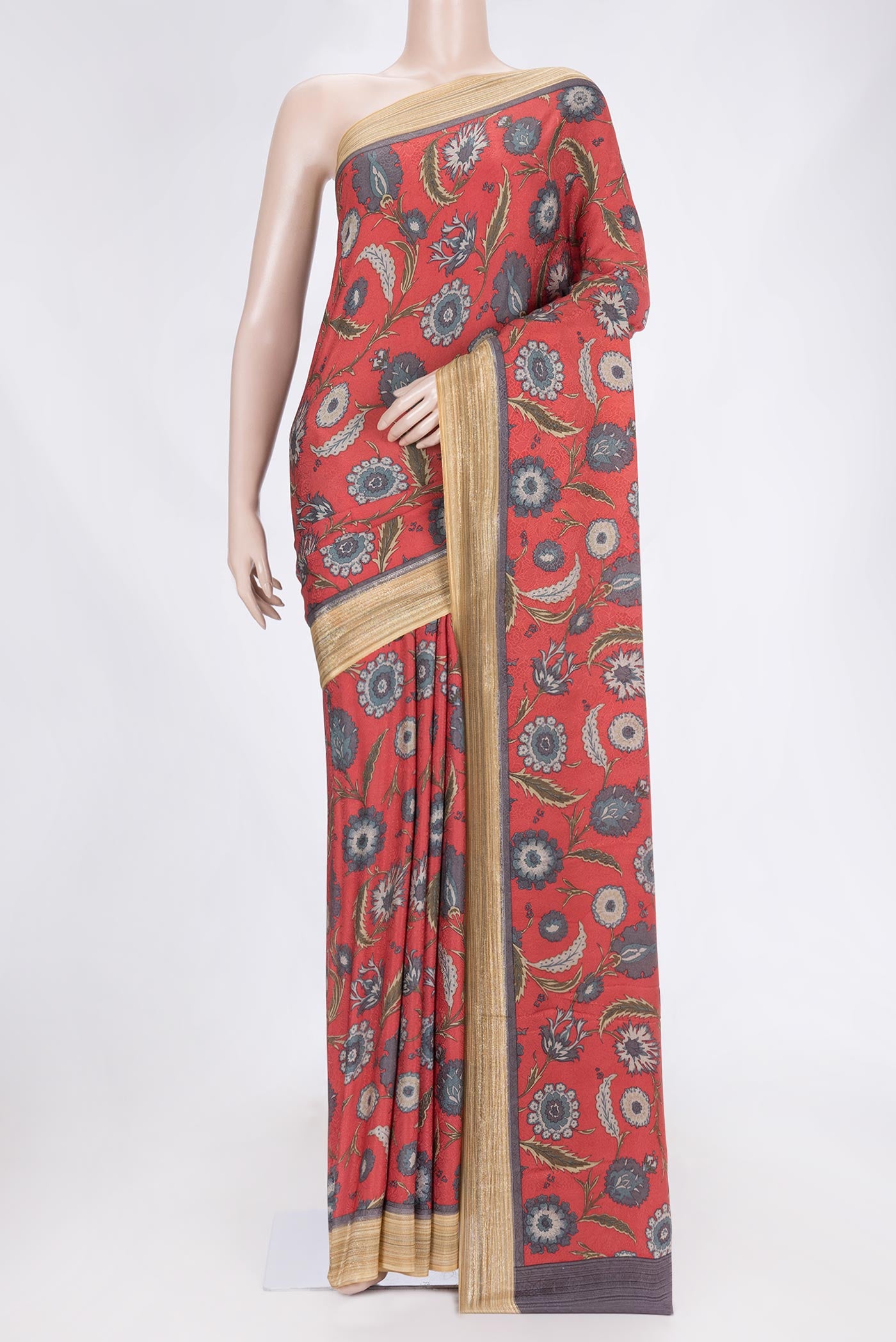 Orange Dual Tone Mysore Crepe Saree with Printed design on the body and Zari Border.  displayed on a mannequin