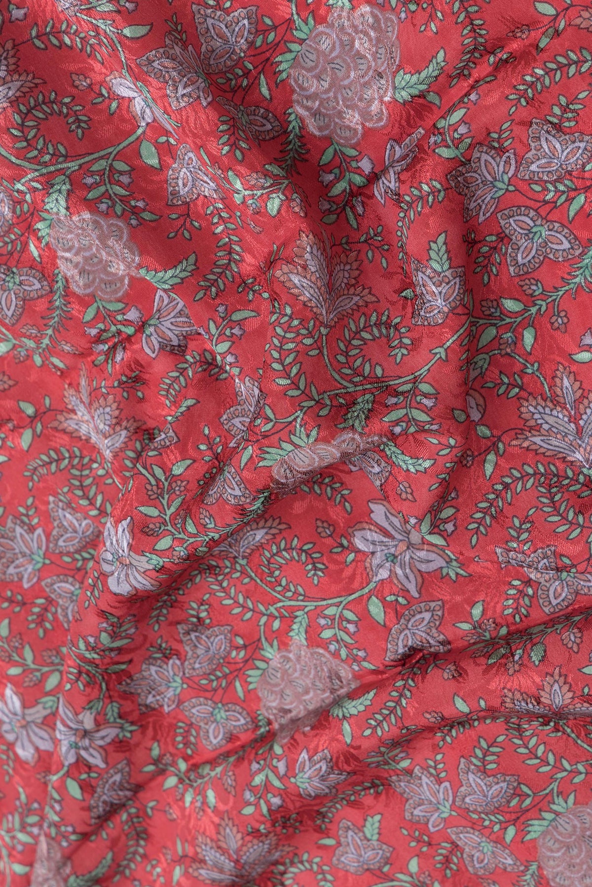 Close up of Pink Dual Tone Mysore Crepe Saree with Printed design on the body and Zari Border.  displaying folds