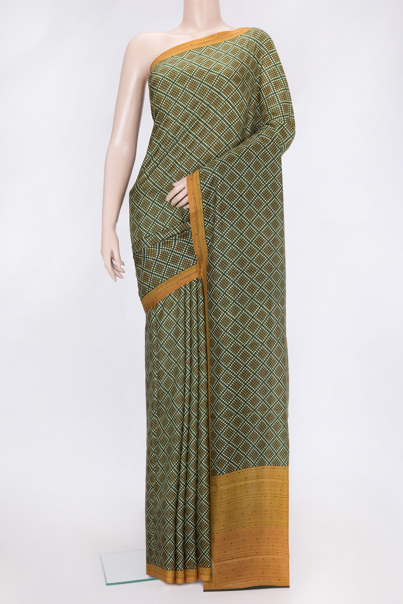 Green Dual Tone Printed Silk Saree with Printed design on the body and Plain Border.  displayed on a mannequin