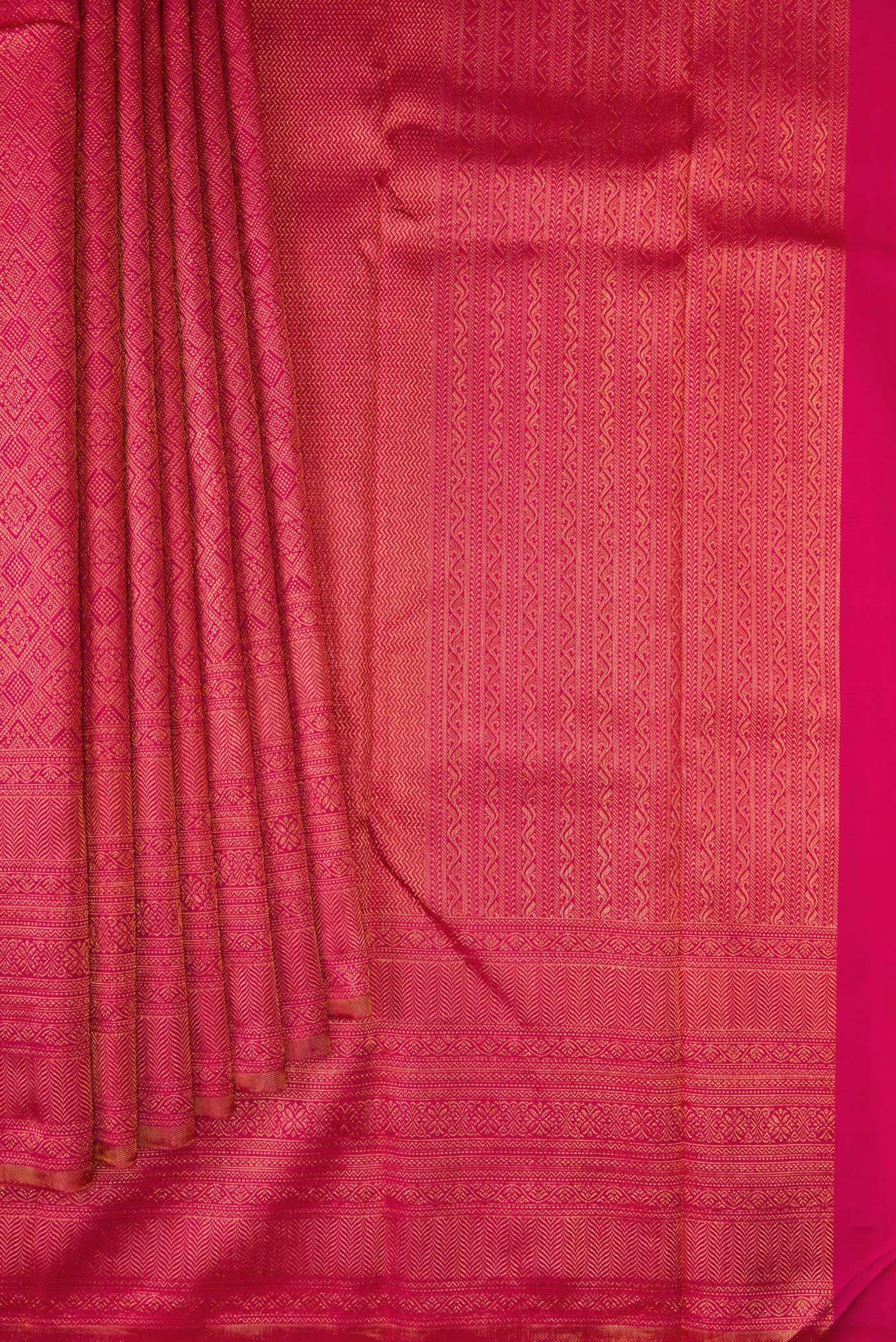Pleats and pallu of Pink Kanchipuram Silk Saree with Zari Brocade on the body and Fancy Border. 