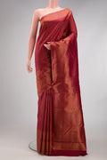 Maroon Kanchipuram Silk Saree with Zari Brocade on the body and Fancy Border.  displayed on a mannequin