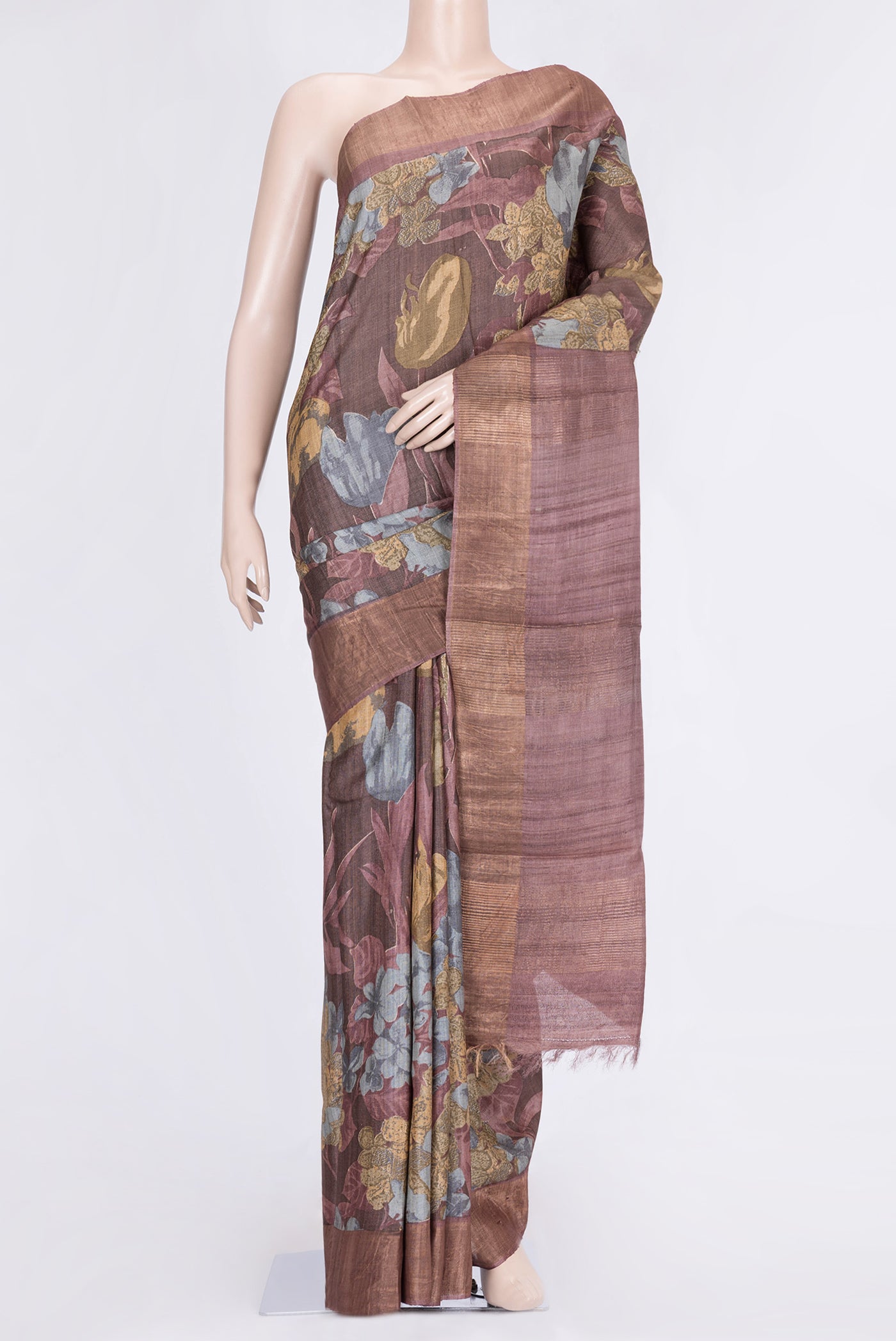 Maroon Dual Tone Tussar Silk Saree with Printed design on the body and Zari Border.  displayed on a mannequin