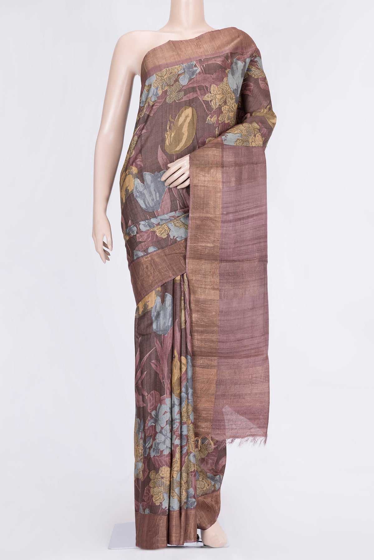 Maroon Dual Tone Tussar Silk Saree with Printed design on the body and Zari Border.  displayed on a mannequin