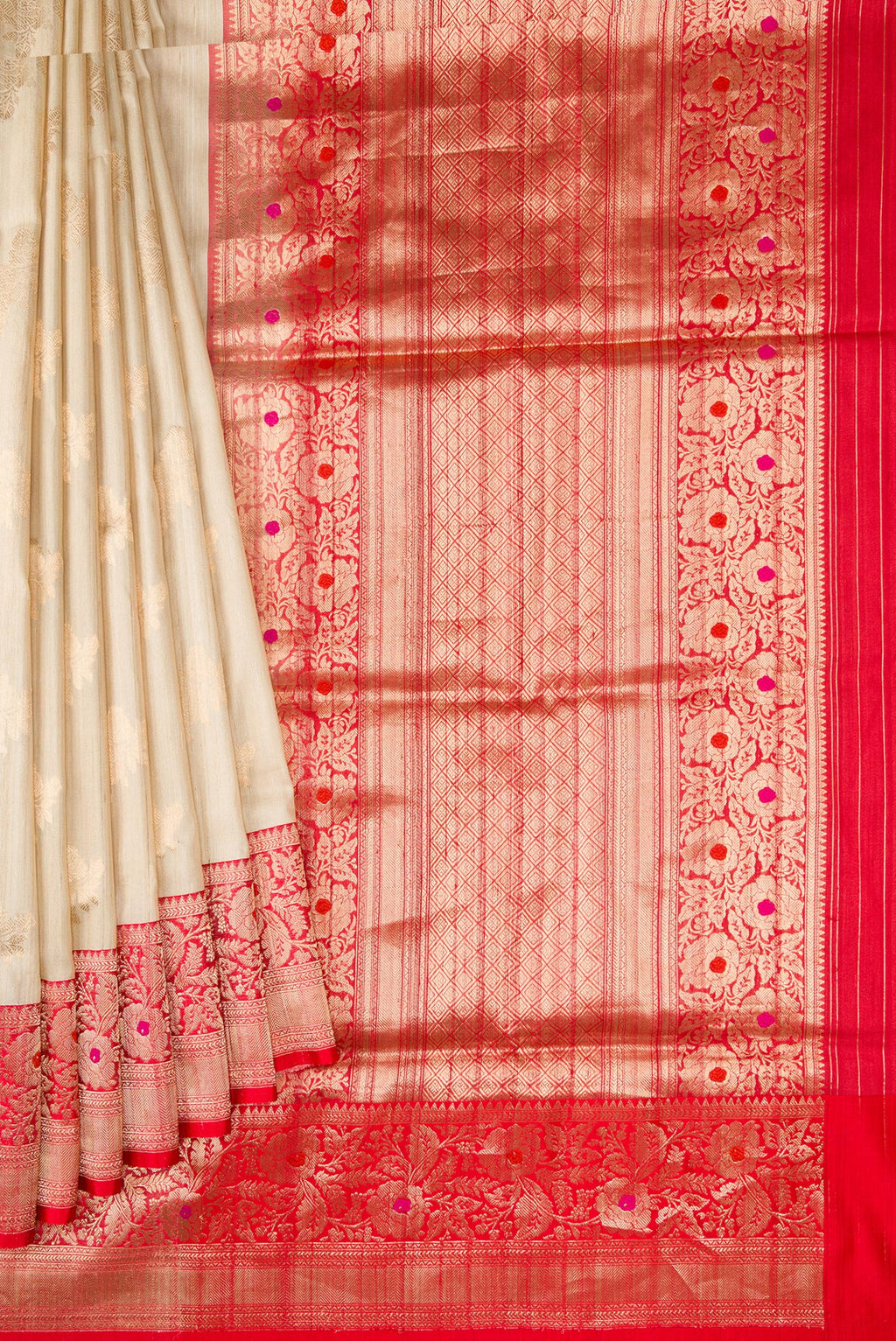 Pleats and pallu of Beige Dual Tone Tussar Silk Saree with Zari Butta on the body and Zari And Thread Border. 
