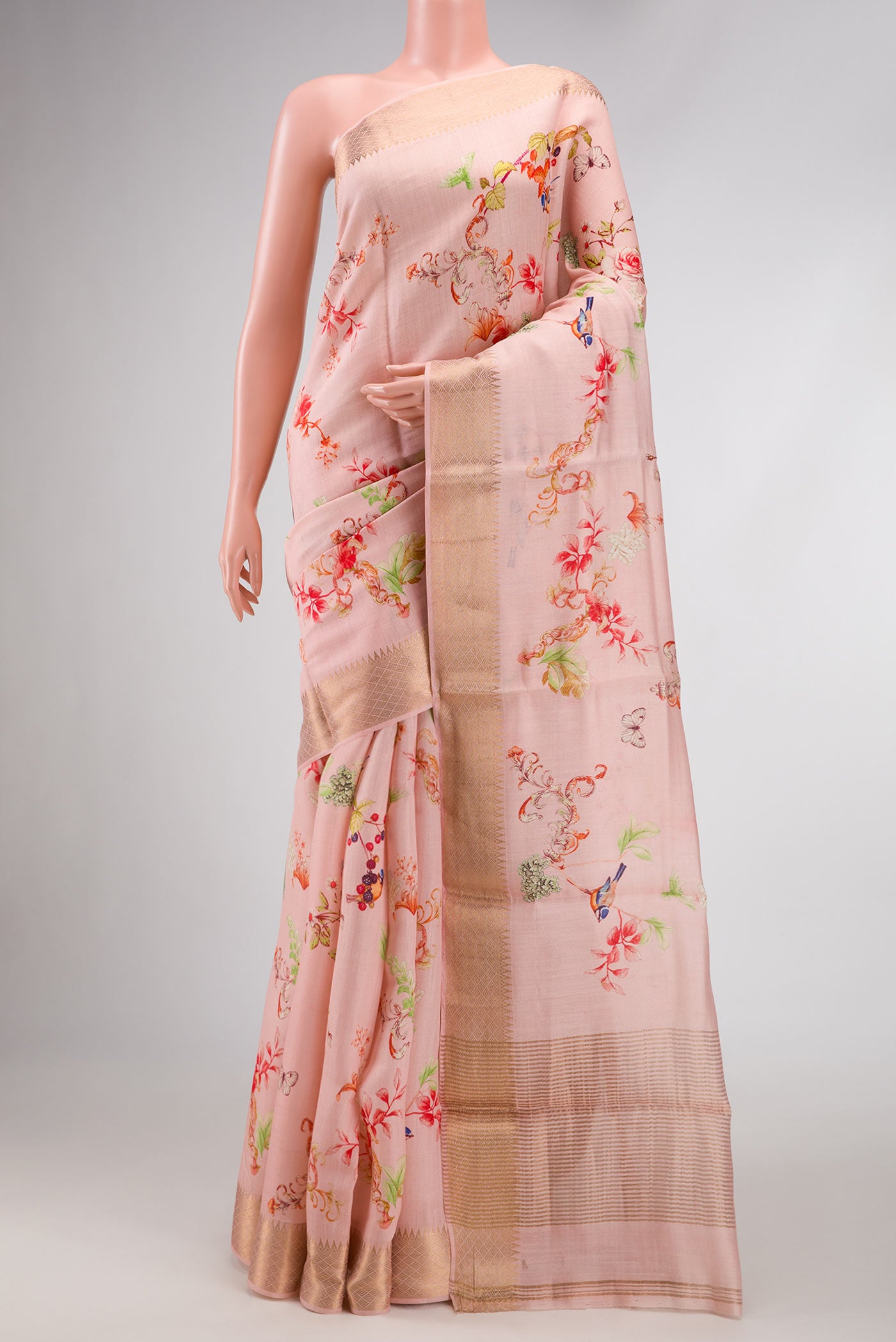 Pink Dual Tone Tussar Silk Saree with Printed design on the body and Zari Border.  displayed on a mannequin