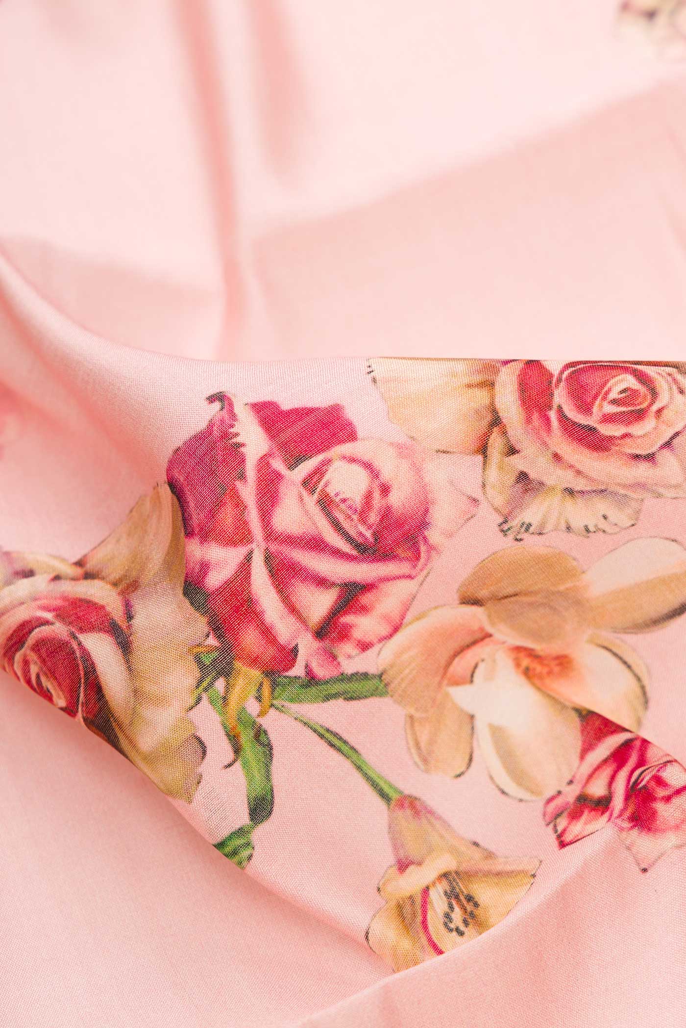 Close up of Pink Dual Tone Tussar Silk Saree with Printed design on the body and Zari Border.  displaying folds