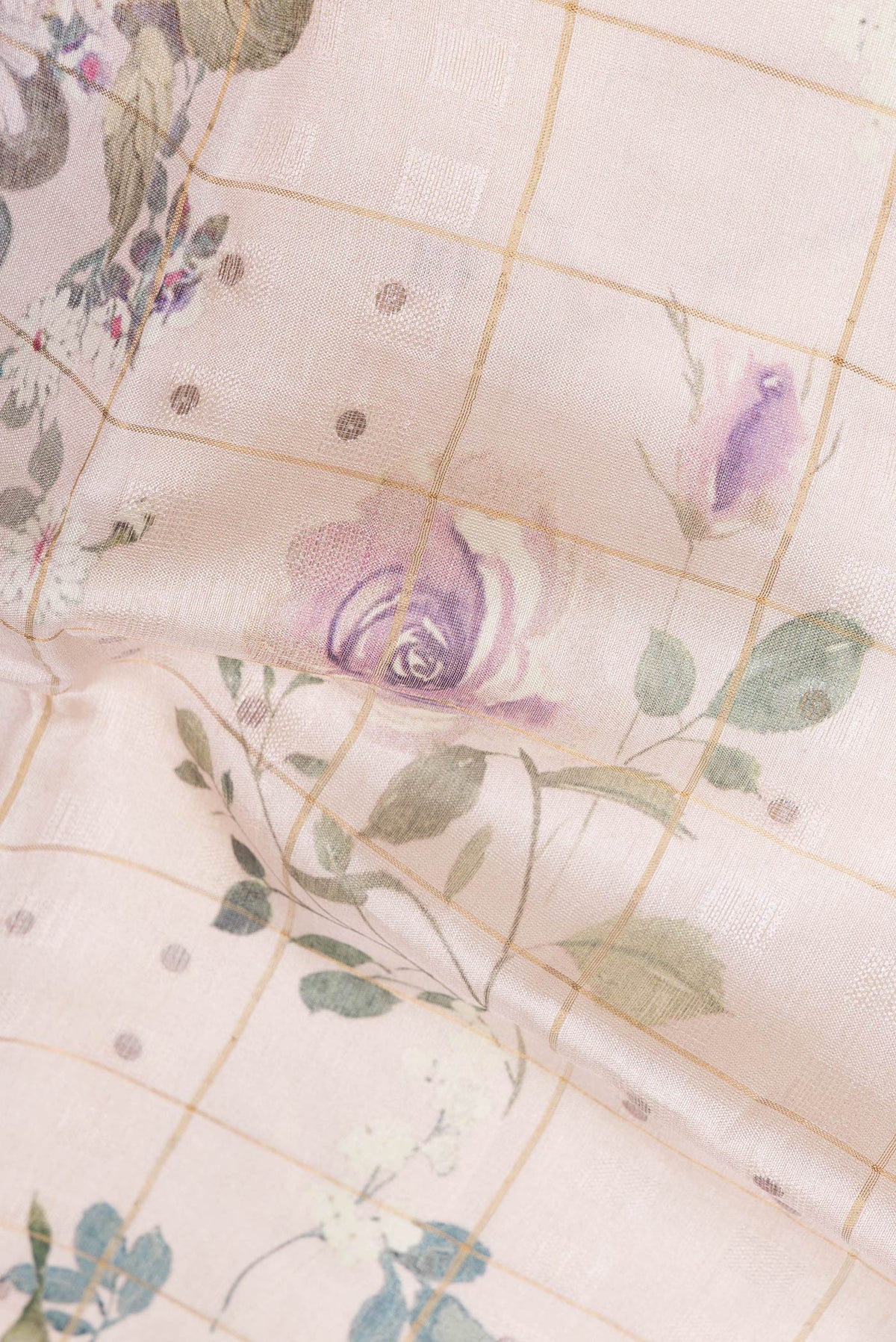 Close up of Pink Dual Tone Tussar Silk Saree with Printed design on the body and Zari Border.  displaying folds