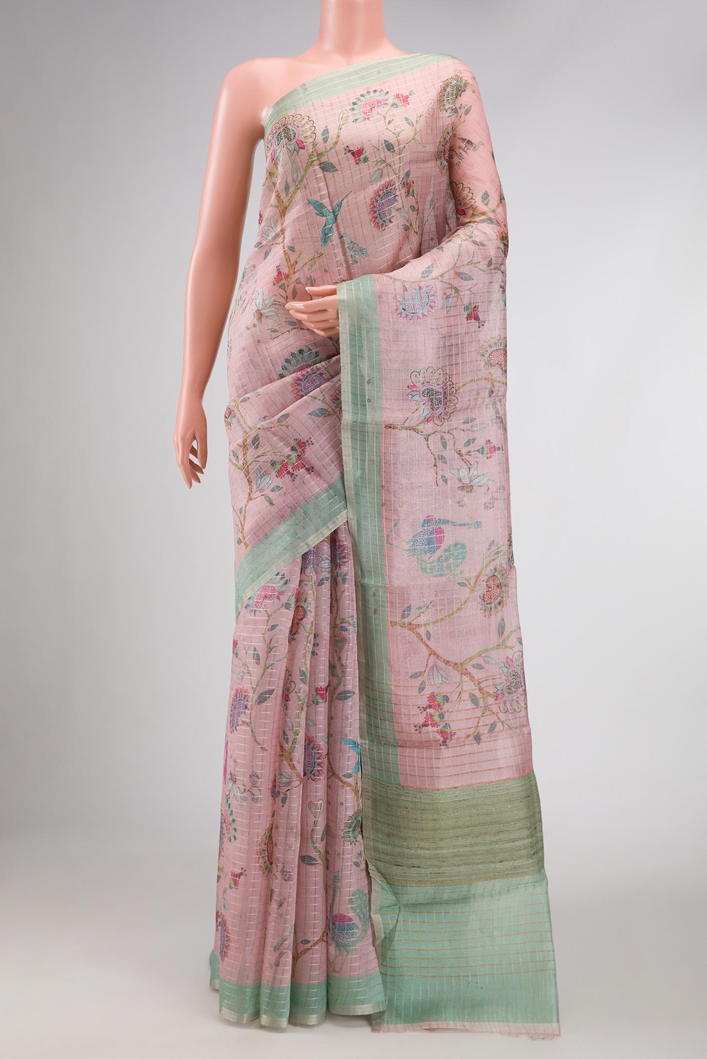 Rose pink Dual Tone Tussar Silk Saree with Printed design on the body and Zari Border.  displayed on a mannequin