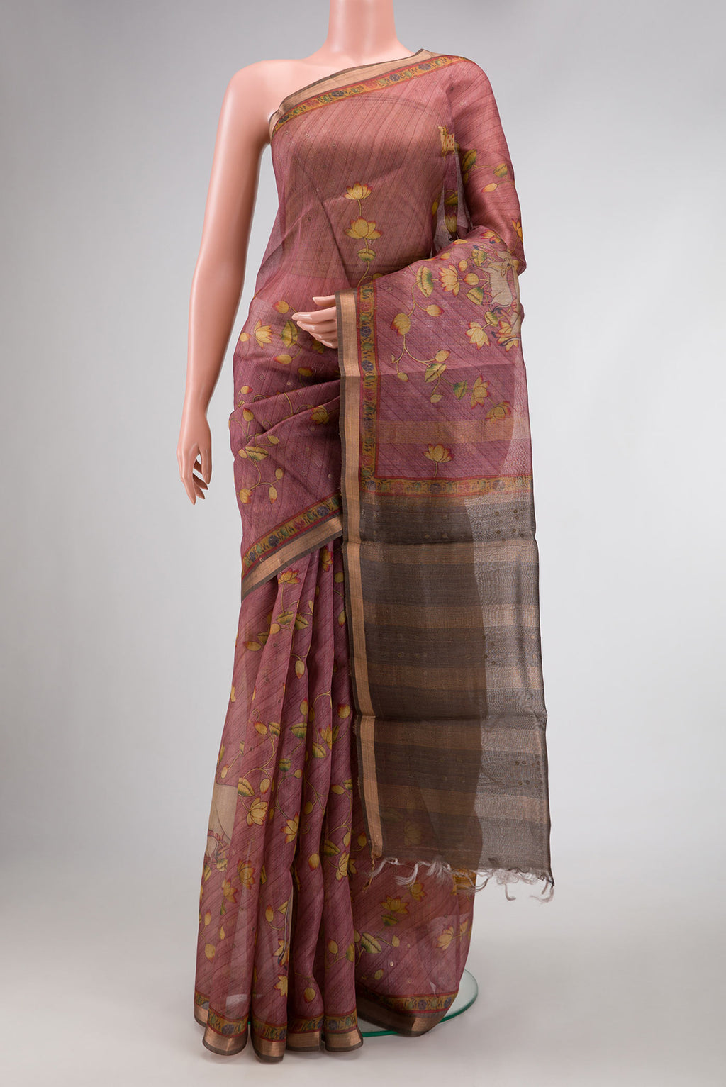 Pink Dual Tone Tussar Silk Saree with Printed design on the body and Zari Border.  displayed on a mannequin