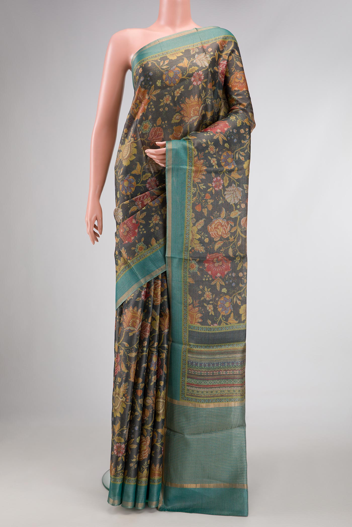 Navy Blue Dual Tone Tussar Silk Saree with Printed design on the body and Zari Border.  displayed on a mannequin