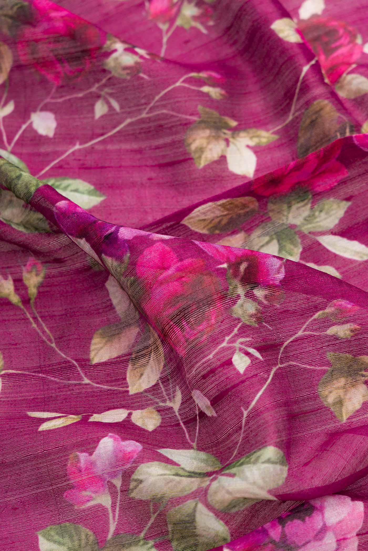 Close up of Purple Dual Tone Tussar Silk Saree with Printed design on the body and Zari Border.  displaying folds