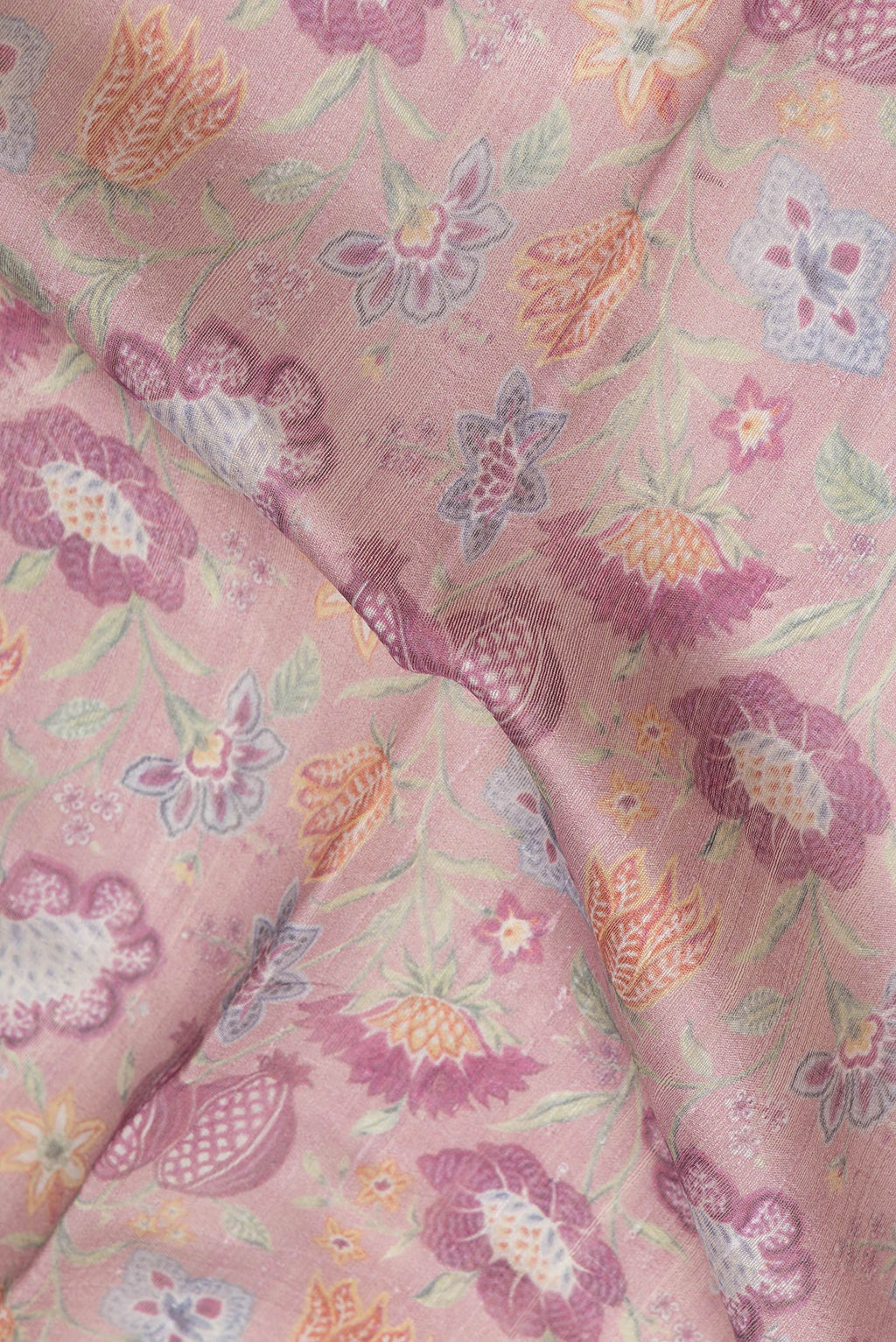 Close up of Pink Dual Tone Tussar Silk Saree with Printed design on the body and Zari Border.  displaying folds