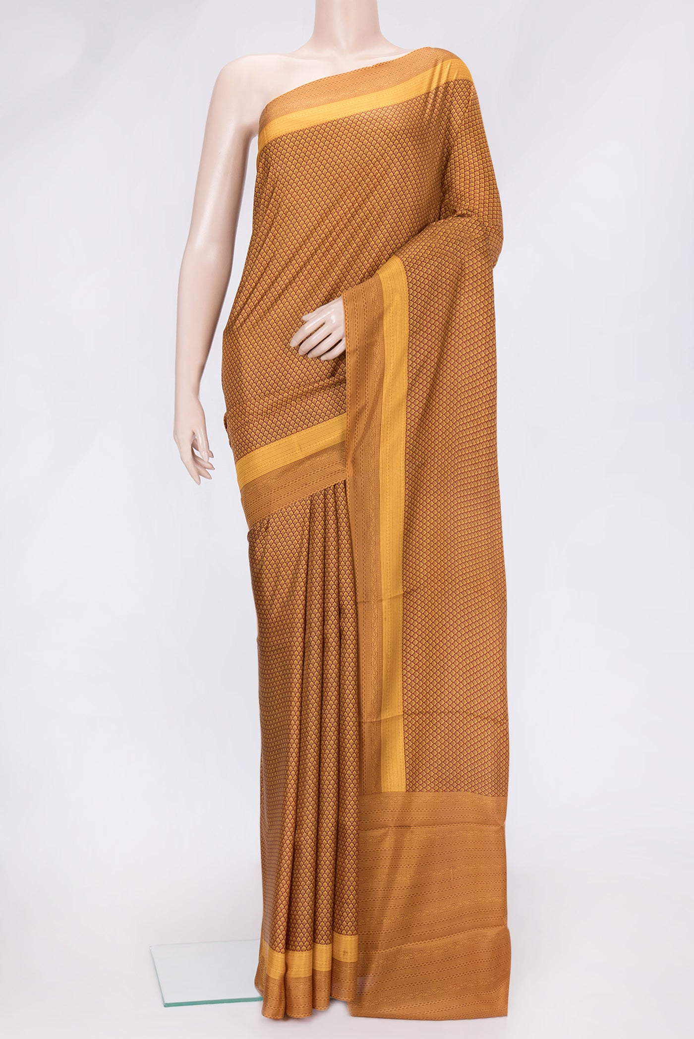 Maroon Dual Tone Printed Silk Saree with Printed design on the body and Printed Border.  displayed on a mannequin