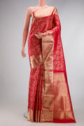 Red Dual Tone Kanchipuram Silk Saree with Zari Brocade on the body and Zari Border.  displayed on a mannequin