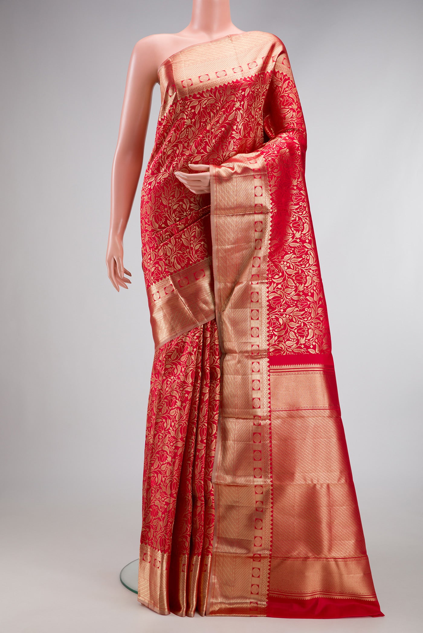 Red Dual Tone Kanchipuram Silk Saree with Zari Brocade on the body and Zari Border.  displayed on a mannequin