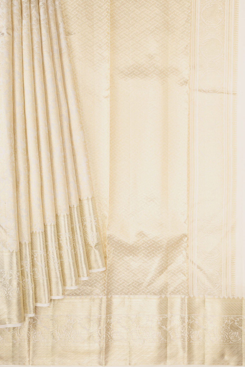 Pleats and pallu of Off White Kanchipuram Silk Saree with Zari Brocade on the body and Zari Border. 