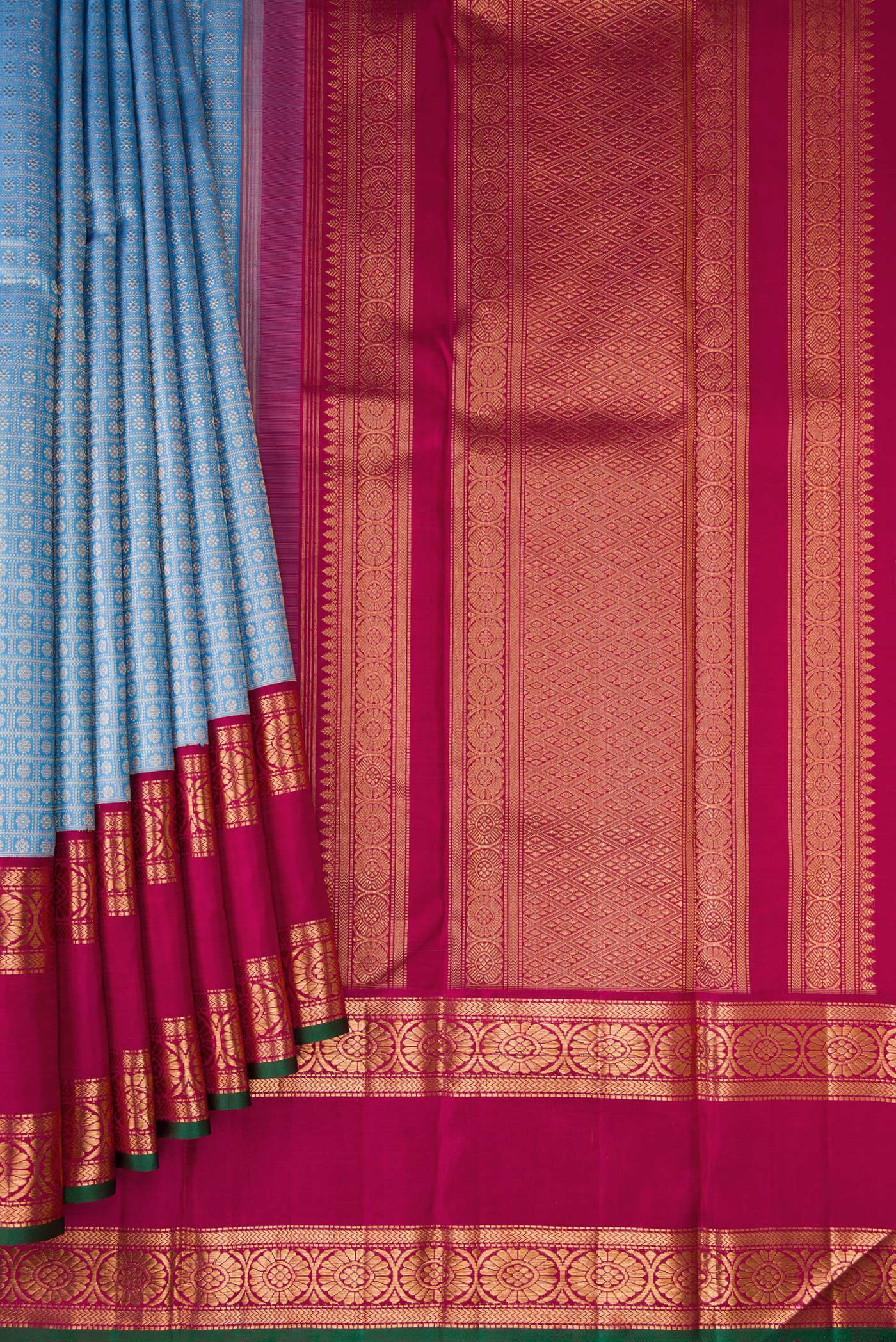Pleats and pallu of Light Blue Dual Tone Kanchipuram Silk Saree with Zari Brocade on the body and Zari Border. 