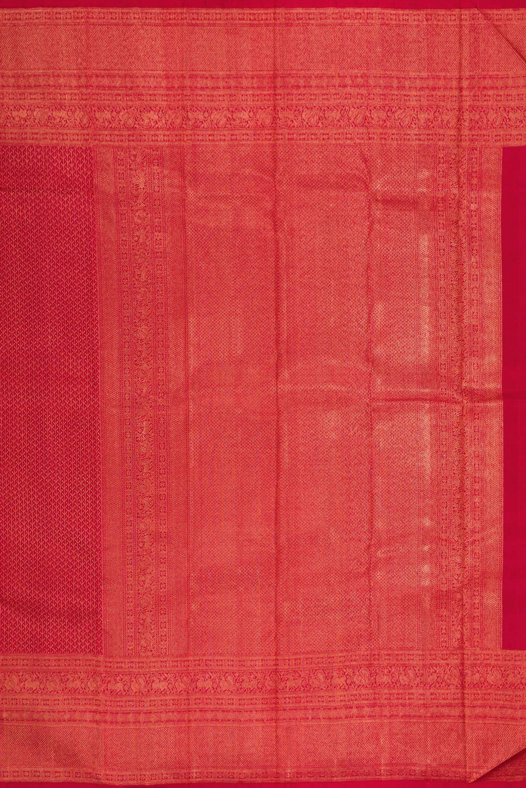 Close up image of the pallu of Red Kanjivaram Silk Saree with Zari Brocade on the body and Fancy Border. 