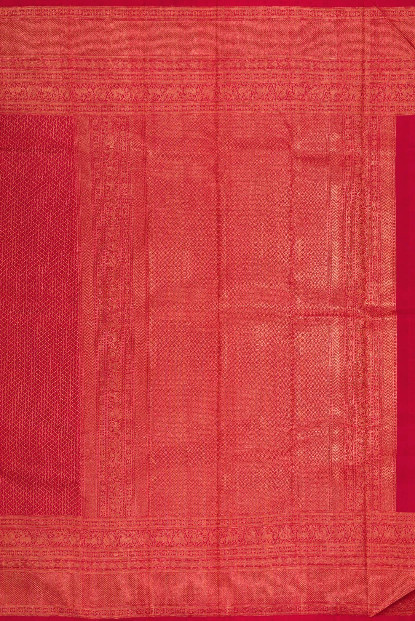 Close up image of the pallu of Red Kanjivaram Silk Saree with Zari Brocade on the body and Fancy Border. 
