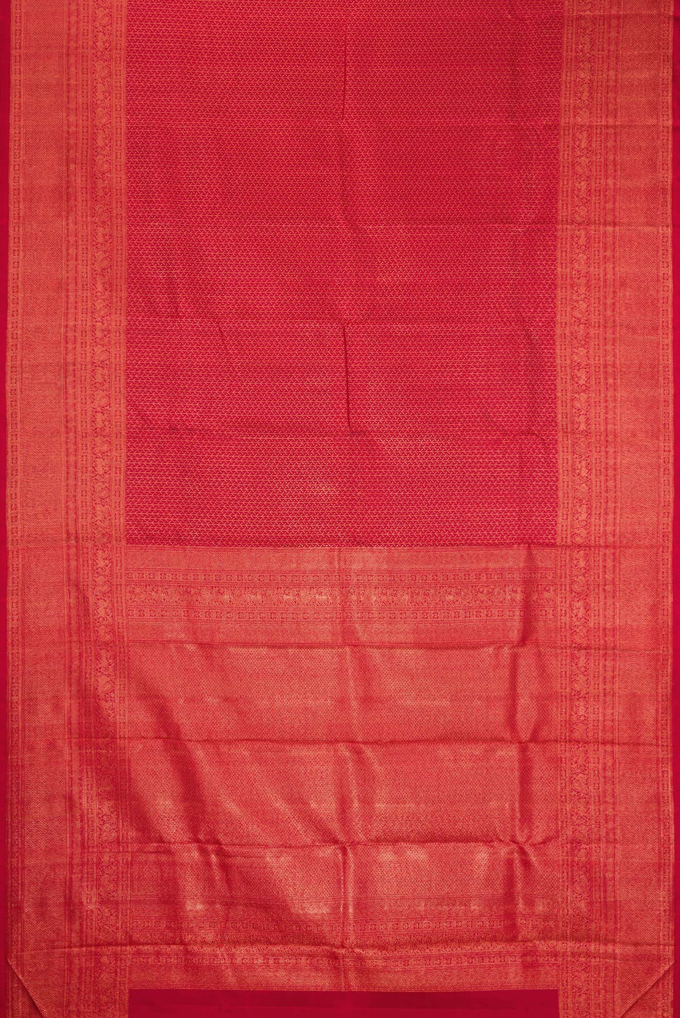 Flat view of Red Kanjivaram Silk Saree with Zari Brocade on the body and Fancy Border. 