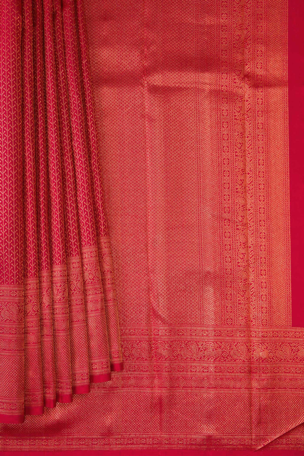 Pleats and pallu of Red Kanjivaram Silk Saree with Zari Brocade on the body and Fancy Border. 
